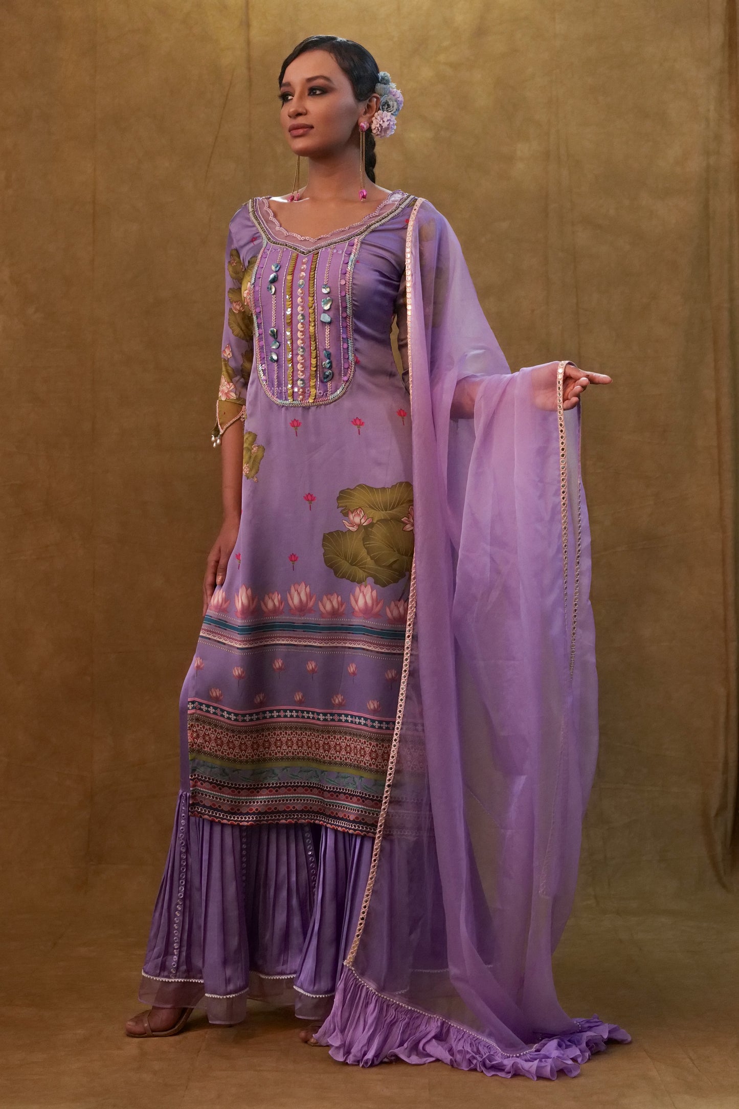 Lavender printed kurta set paired with organza dupatta and flared pants
