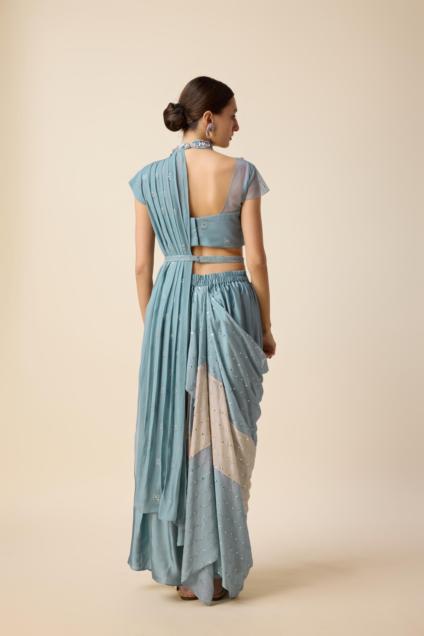 FUSION SAREE LOOK WITH DRAPE SKIRT AND ONE SIDED SHRUG.