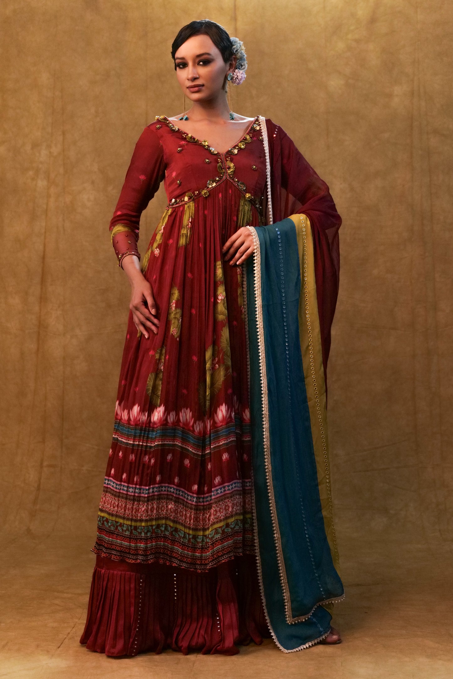 Maroon printed Anarkali paired with skirt and dupatta