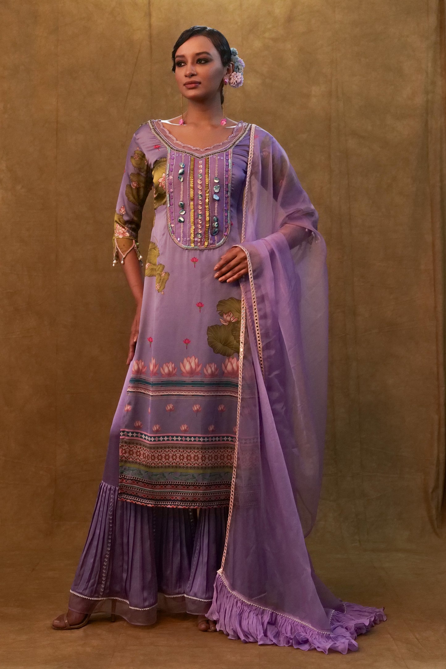 Lavender printed kurta set paired with organza dupatta and flared pants
