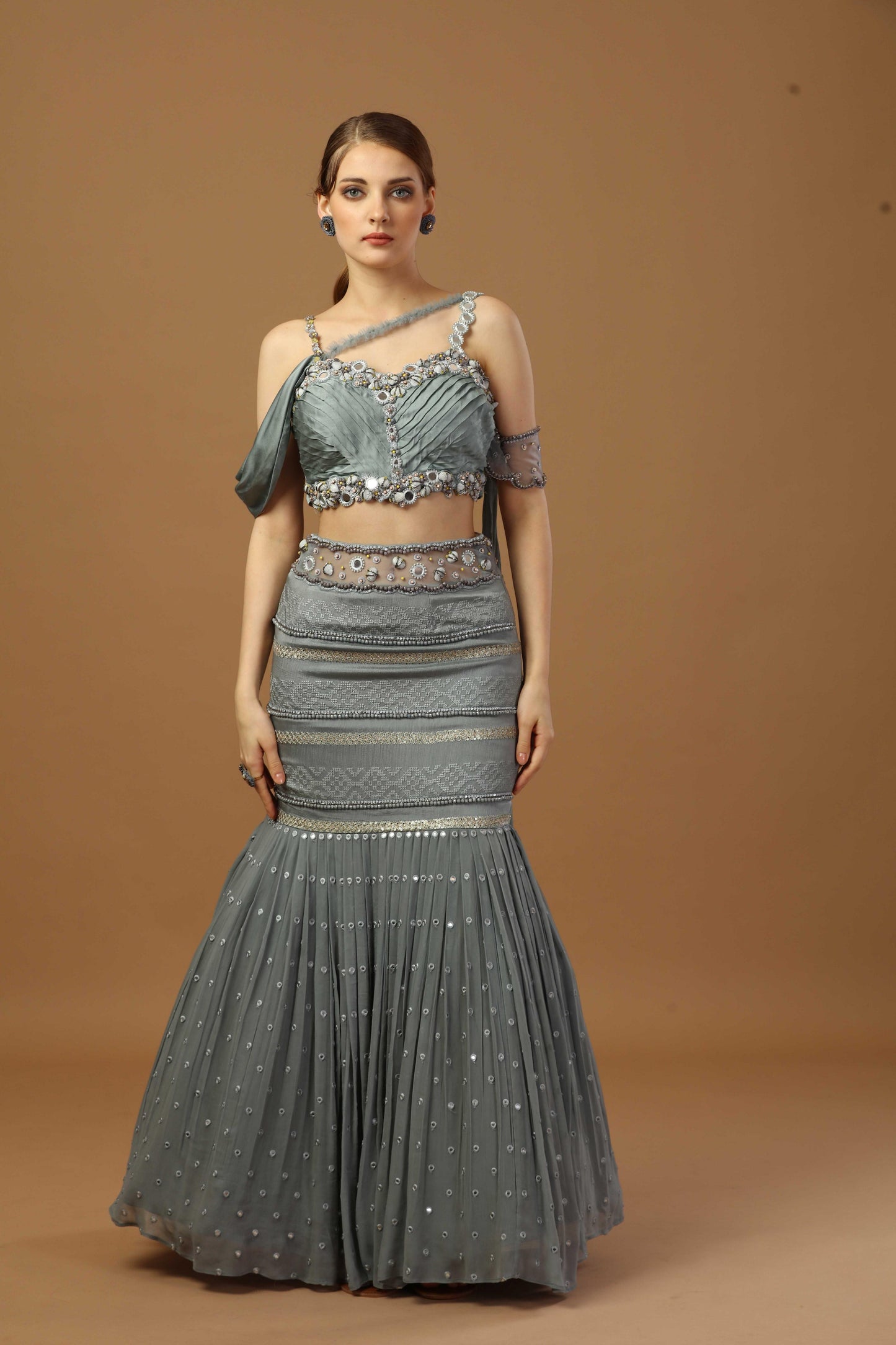 Pleated blouse with fish cut skirt and attach dupatta at back