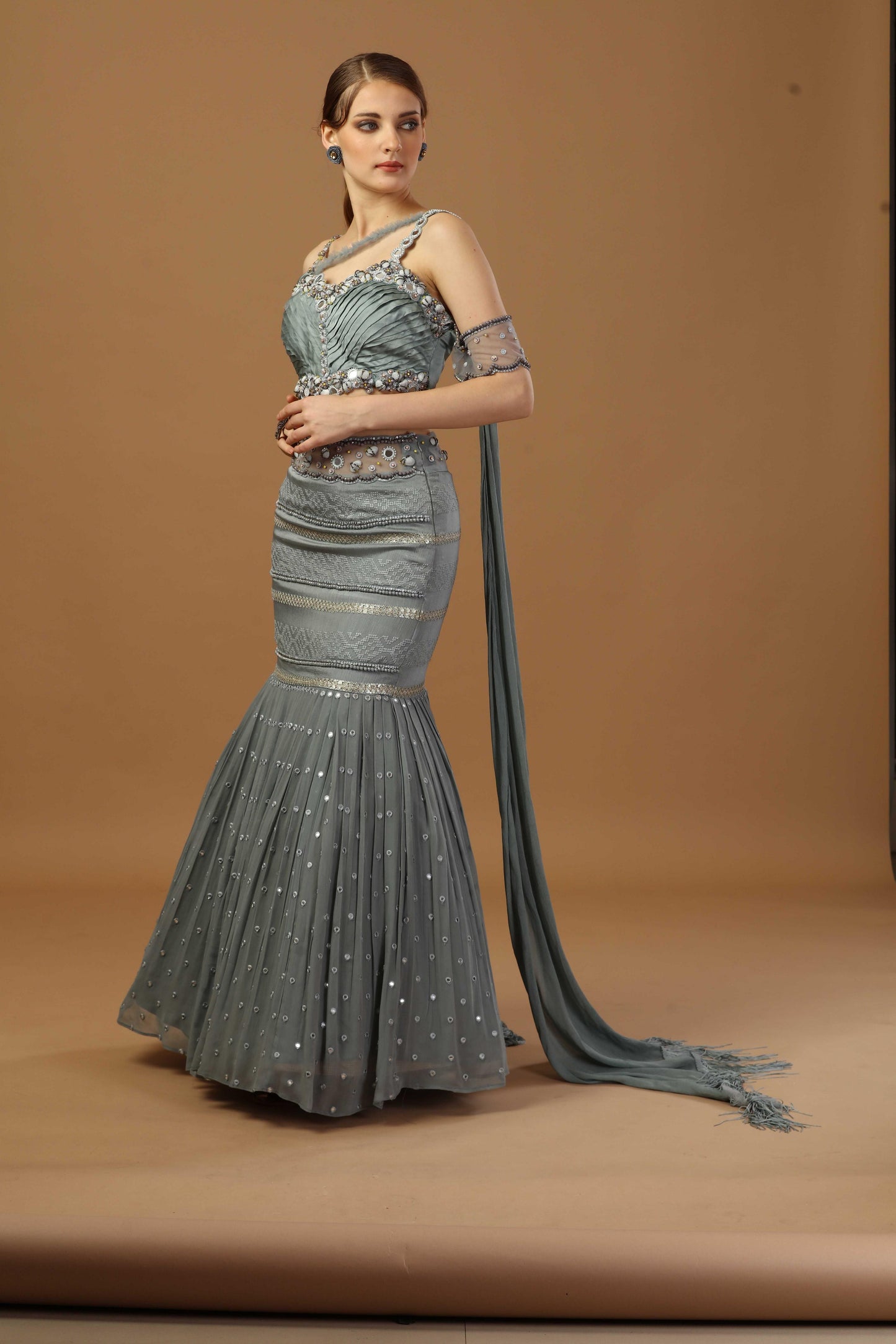 Pleated blouse with fish cut skirt and attach dupatta at back