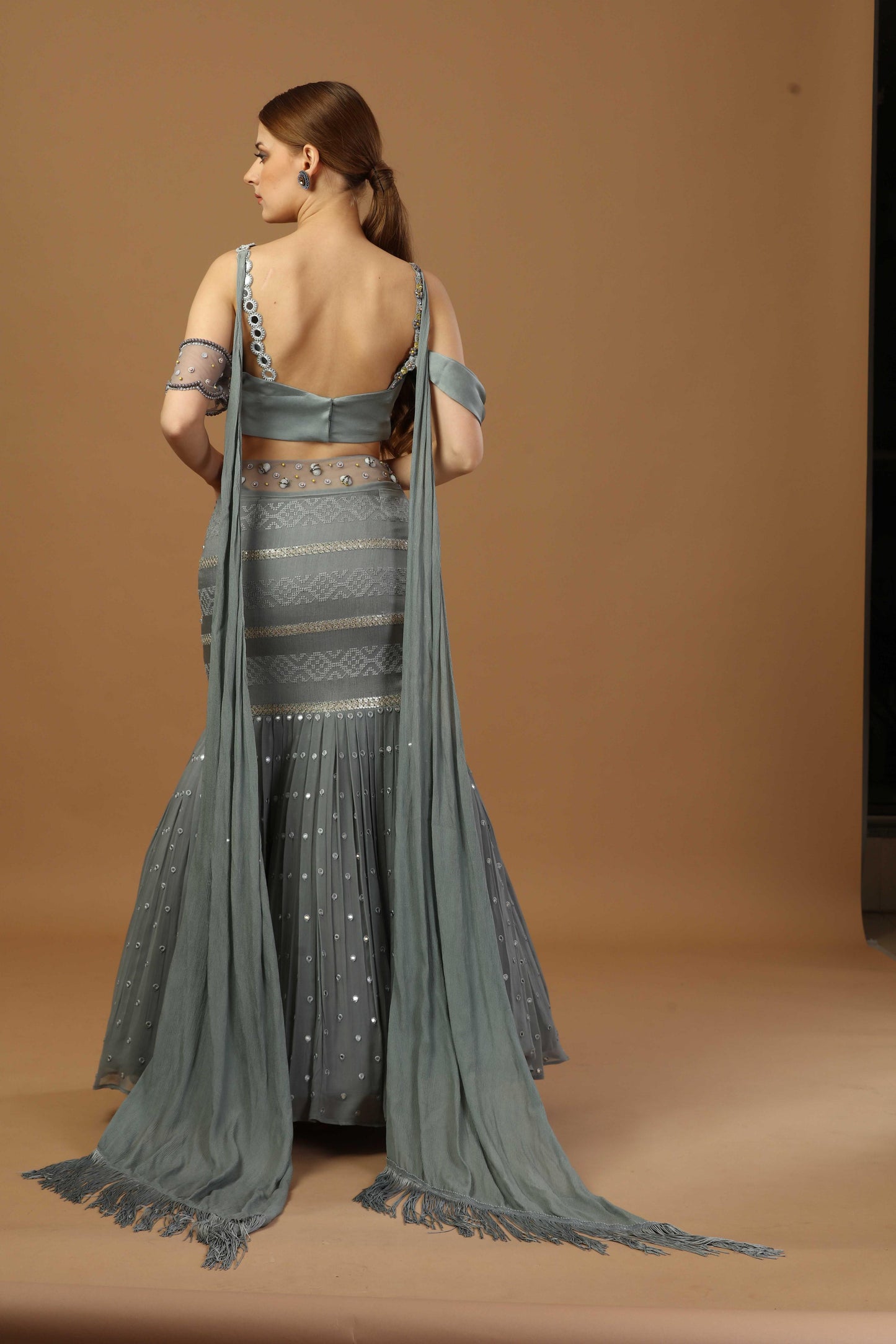 Pleated blouse with fish cut skirt and attach dupatta at back