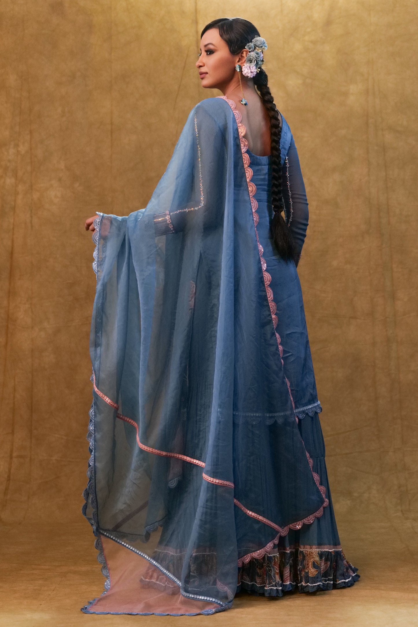 Blue applique work kurta set paired with flared sharara and a Dupatta