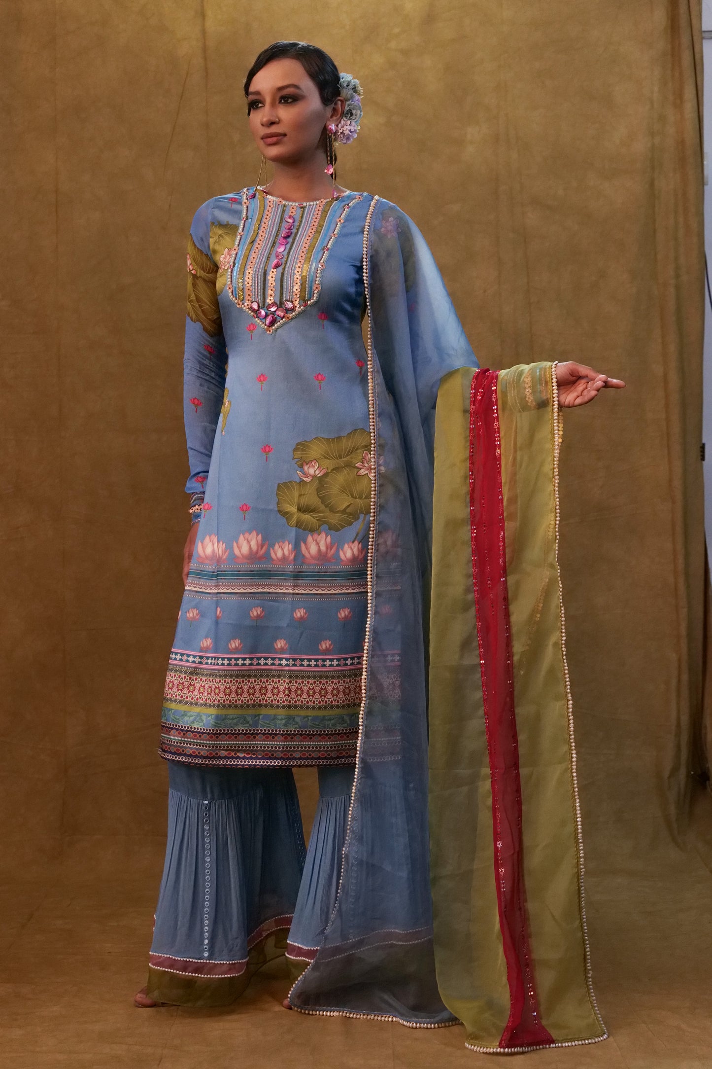 Ocean blue printed kurta set paired with color block dupatta and flared pants