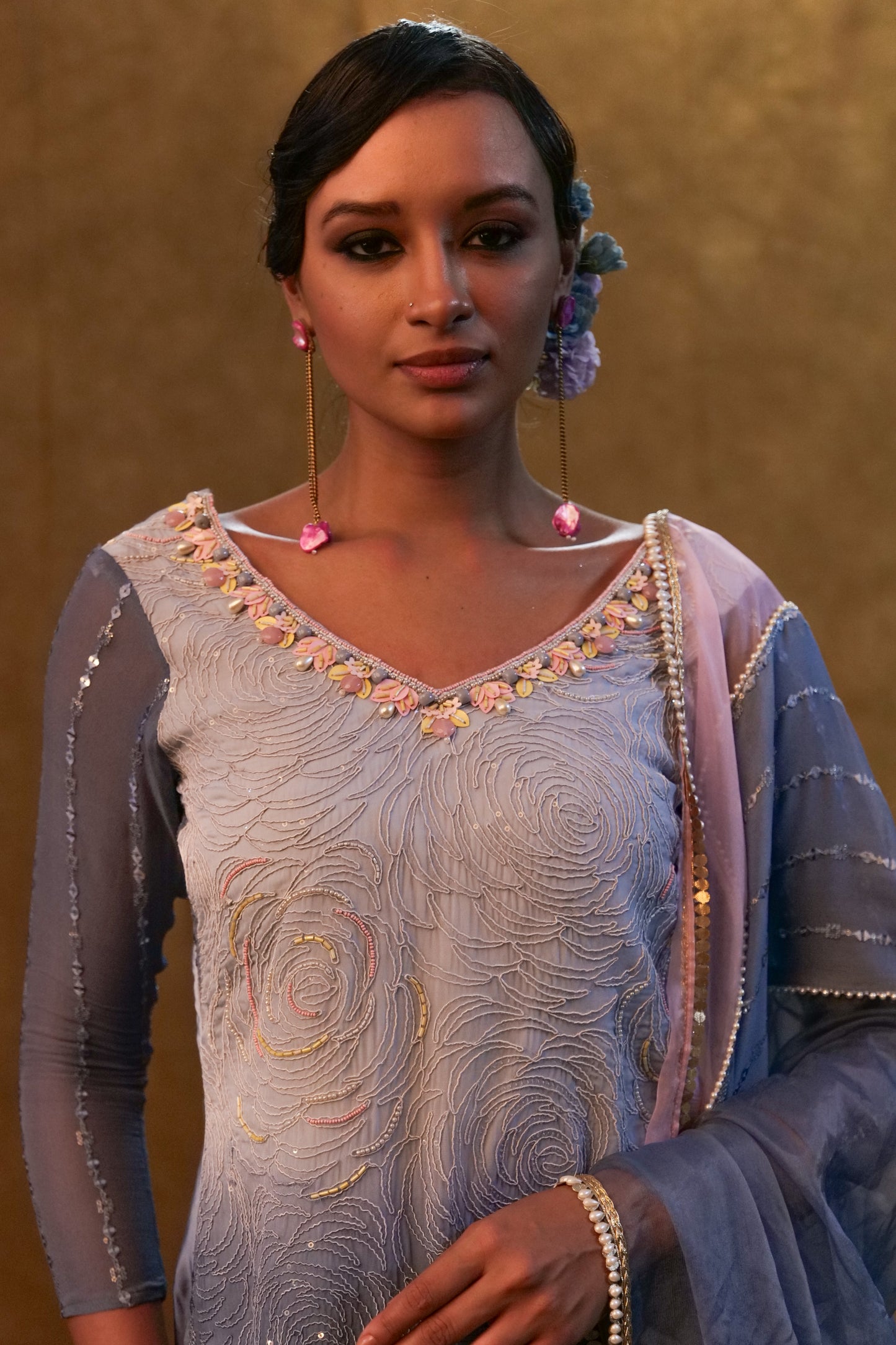 Ice blue shaded kurta set paired with dupatta and layered color block sharara