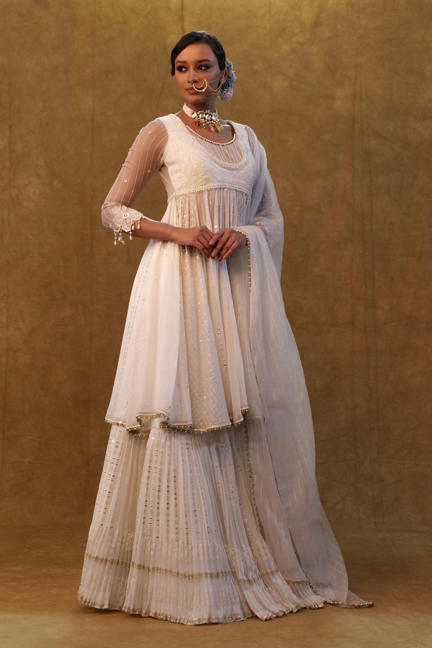 White Anarkali set paired with skirt and dupatta