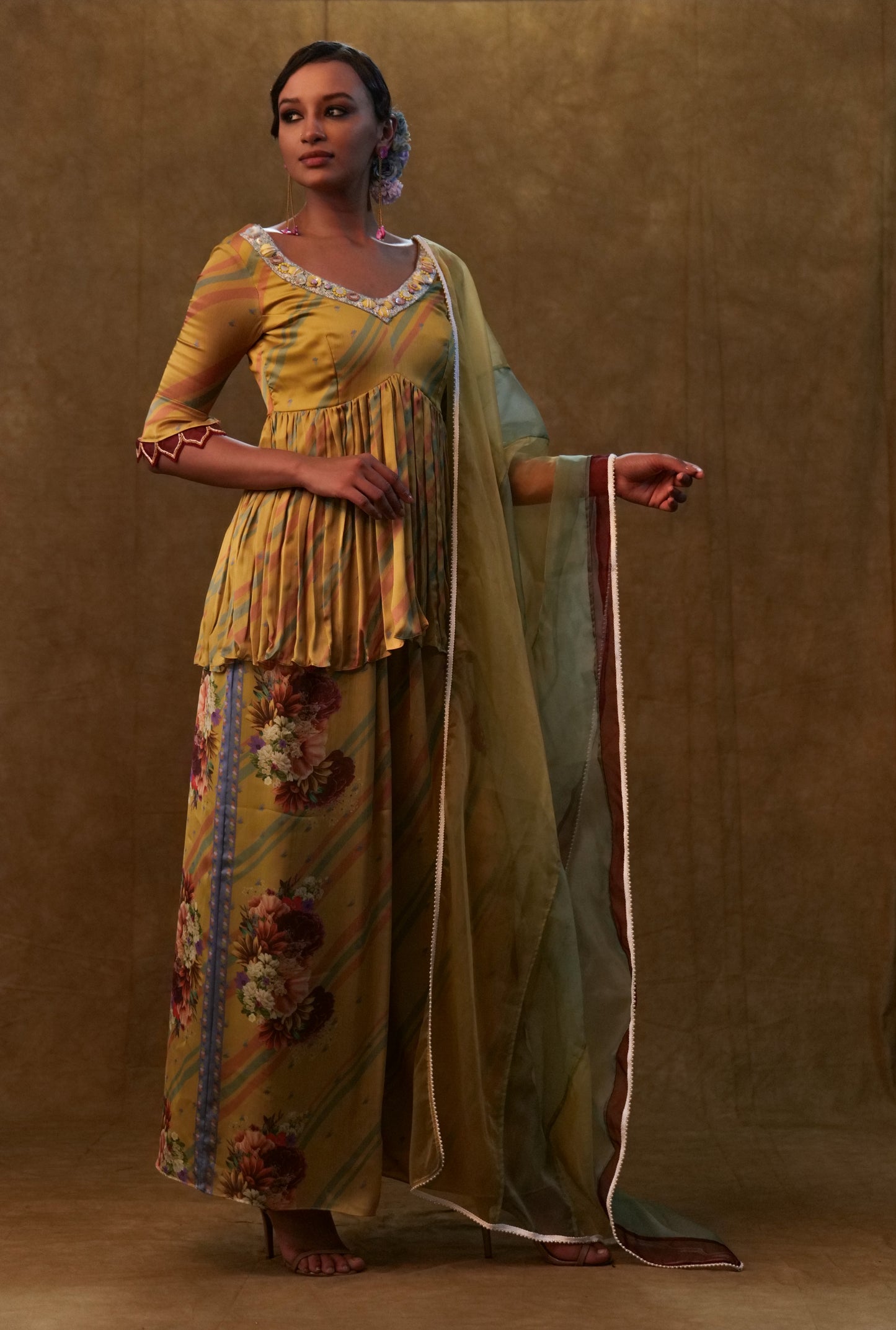 Mustard printed peplum set paired with dupatta and pants