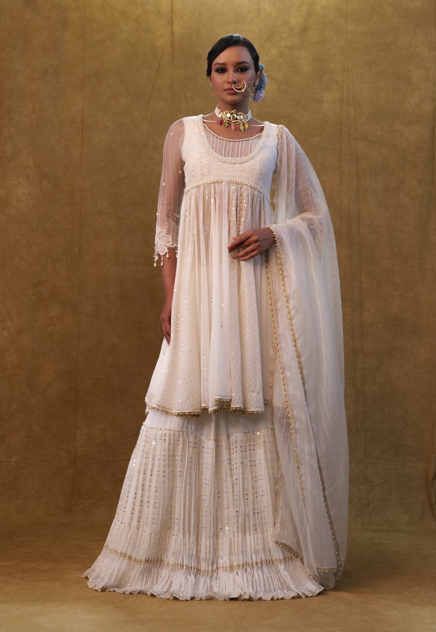 White Anarkali set paired with skirt and dupatta