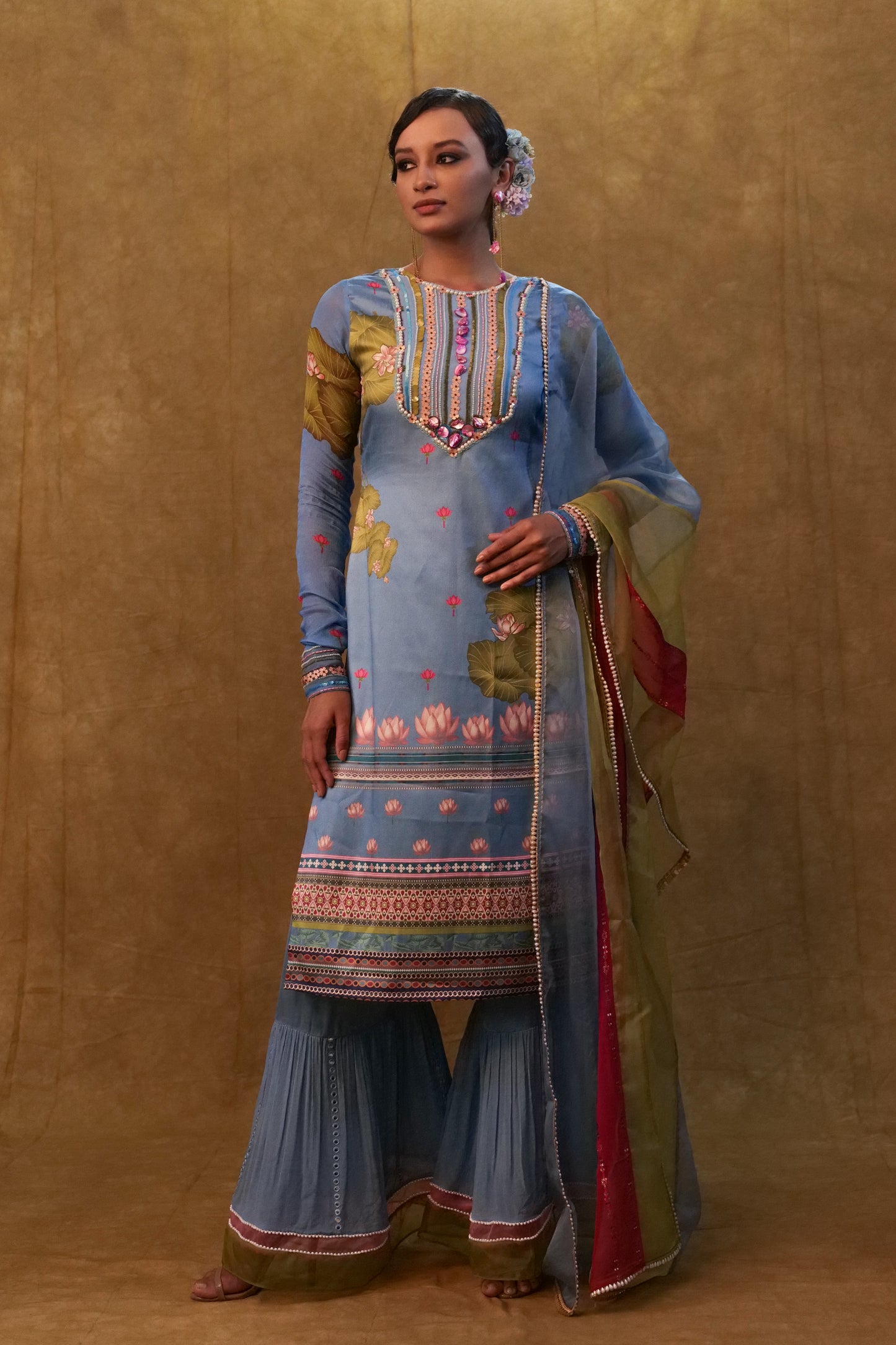 Ocean blue printed kurta set paired with color block dupatta and flared pants