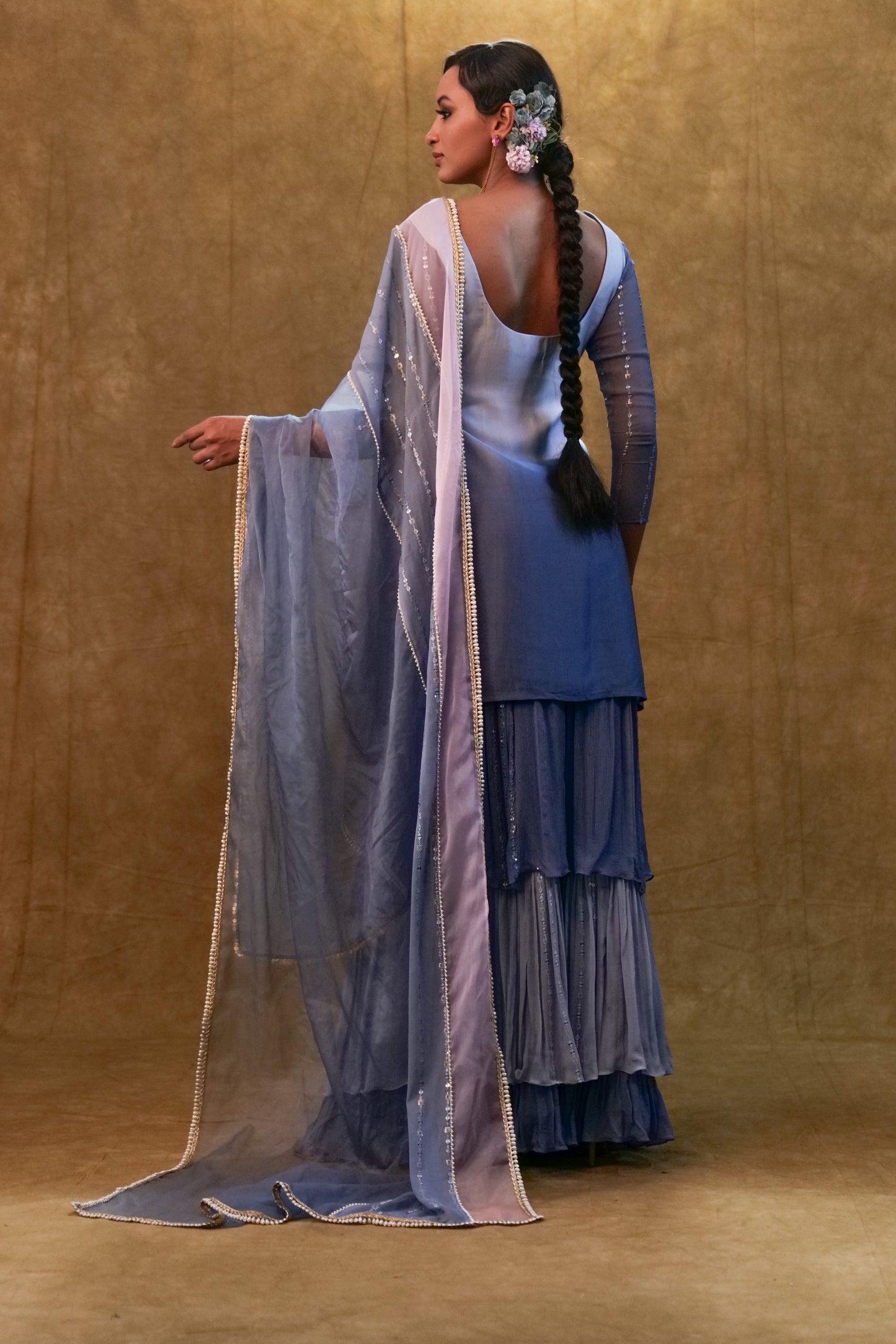 Ice blue shaded kurta set paired with dupatta and layered color block sharara