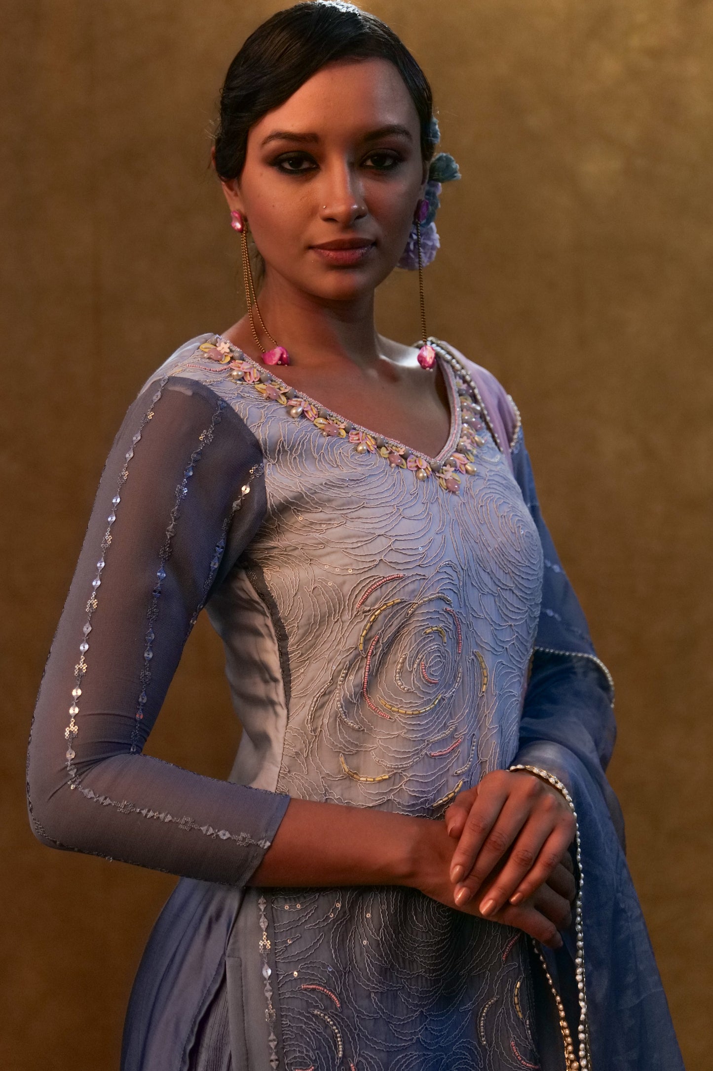 Ice blue shaded kurta set paired with dupatta and layered color block sharara