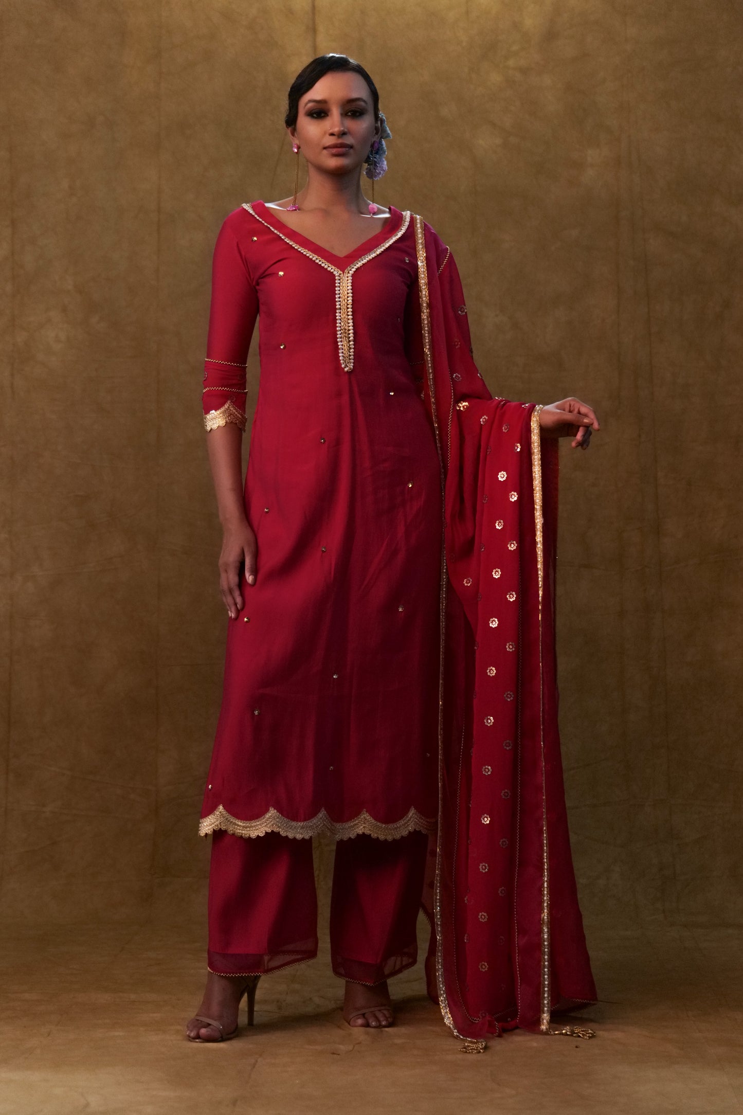 Hot pink kurta set paired with sequin embroidery dupatta and pants