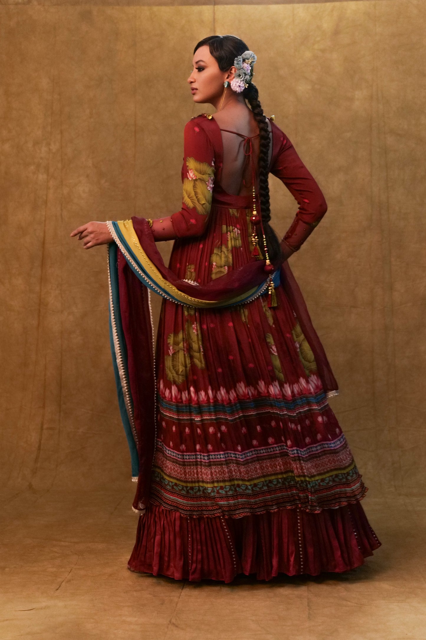 Maroon printed Anarkali paired with skirt and dupatta