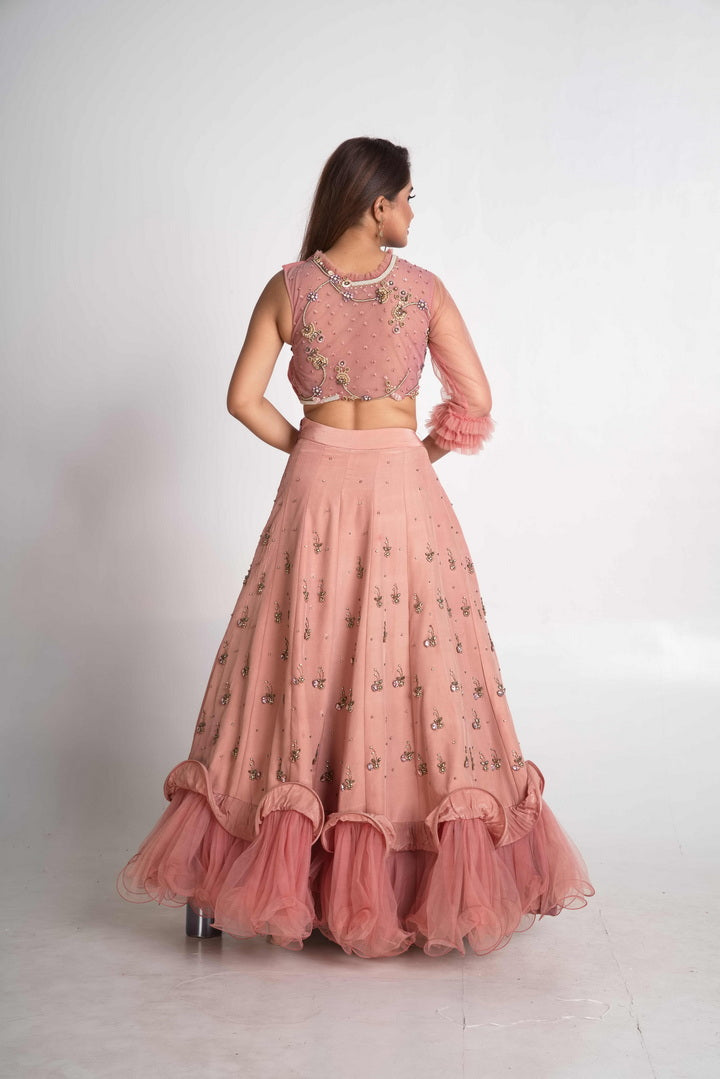 Pink layered lehenga set with pre drape net dupatta