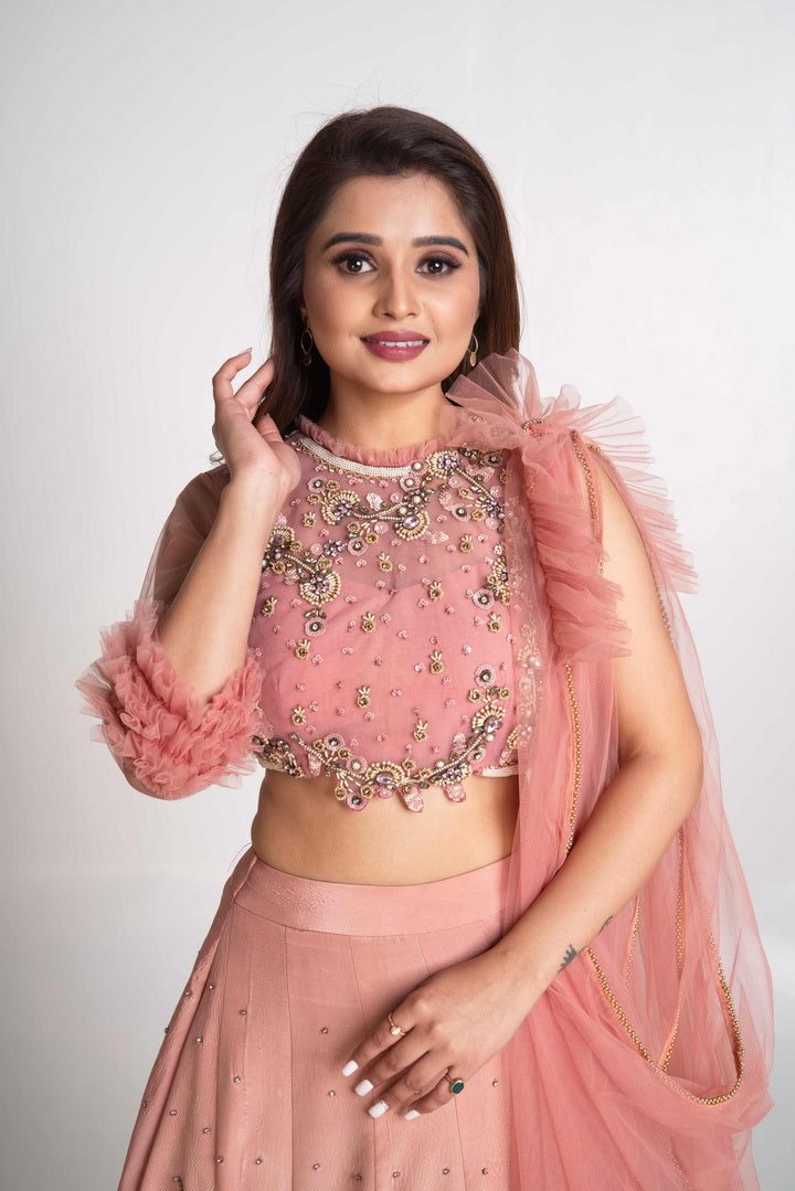 Pink layered lehenga set with pre drape net dupatta