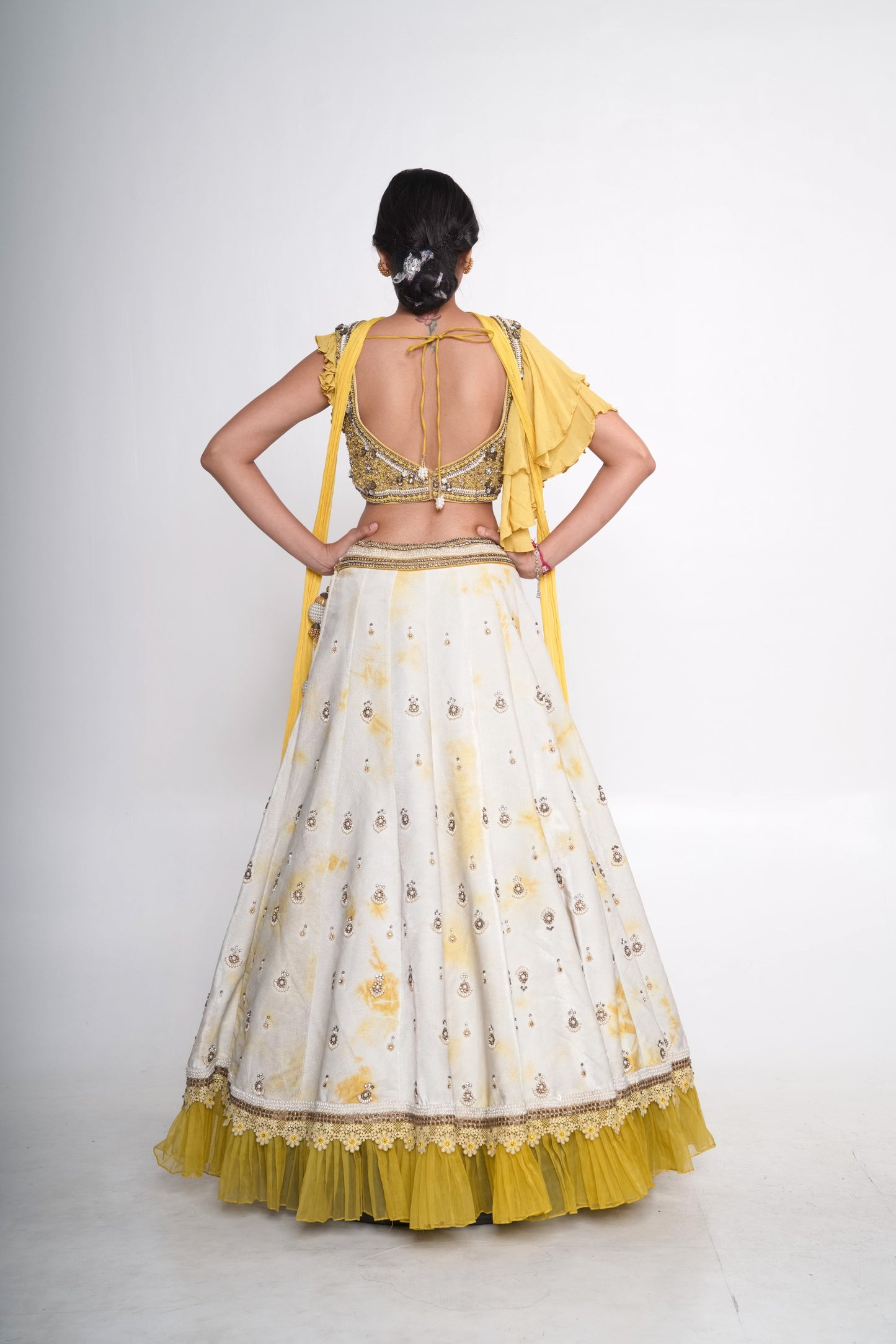 Yellow tye dye velvet lehenga set