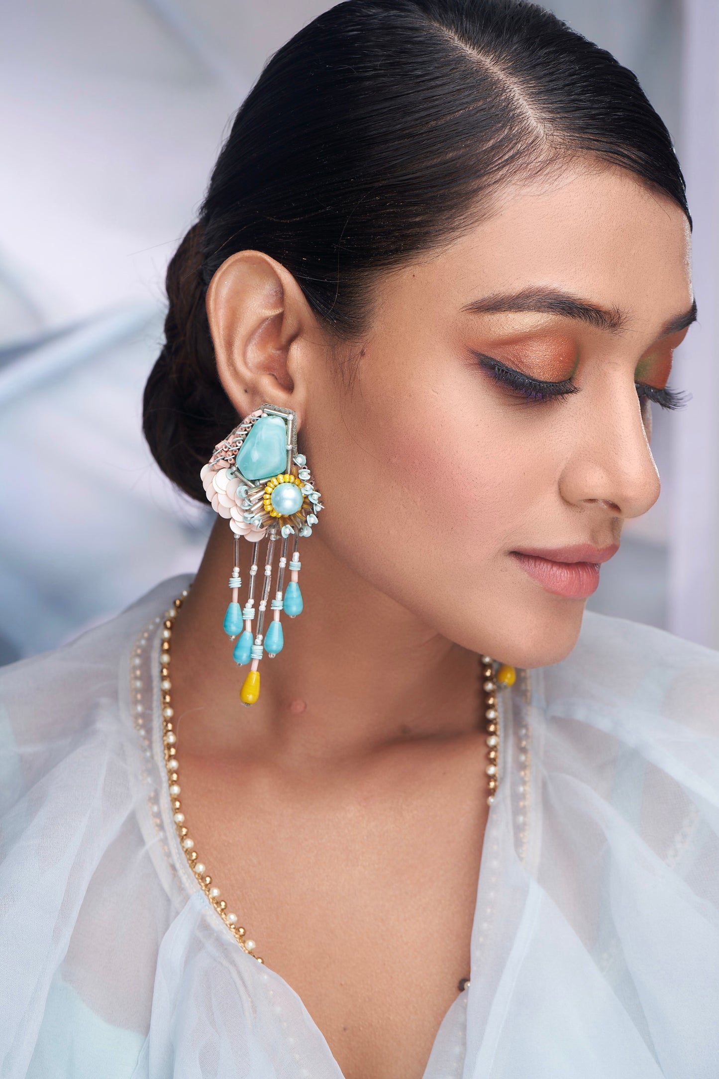 PAIR OF EARRINGS IN BLUE