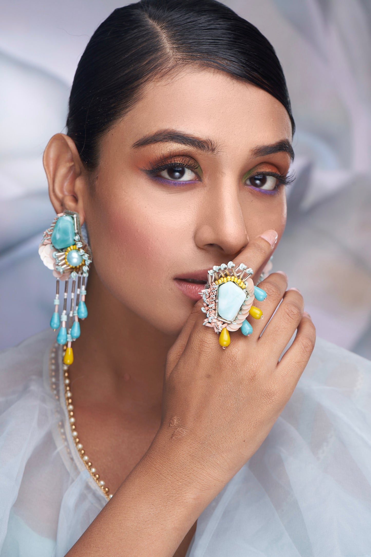 PAIR OF EARRINGS IN BLUE