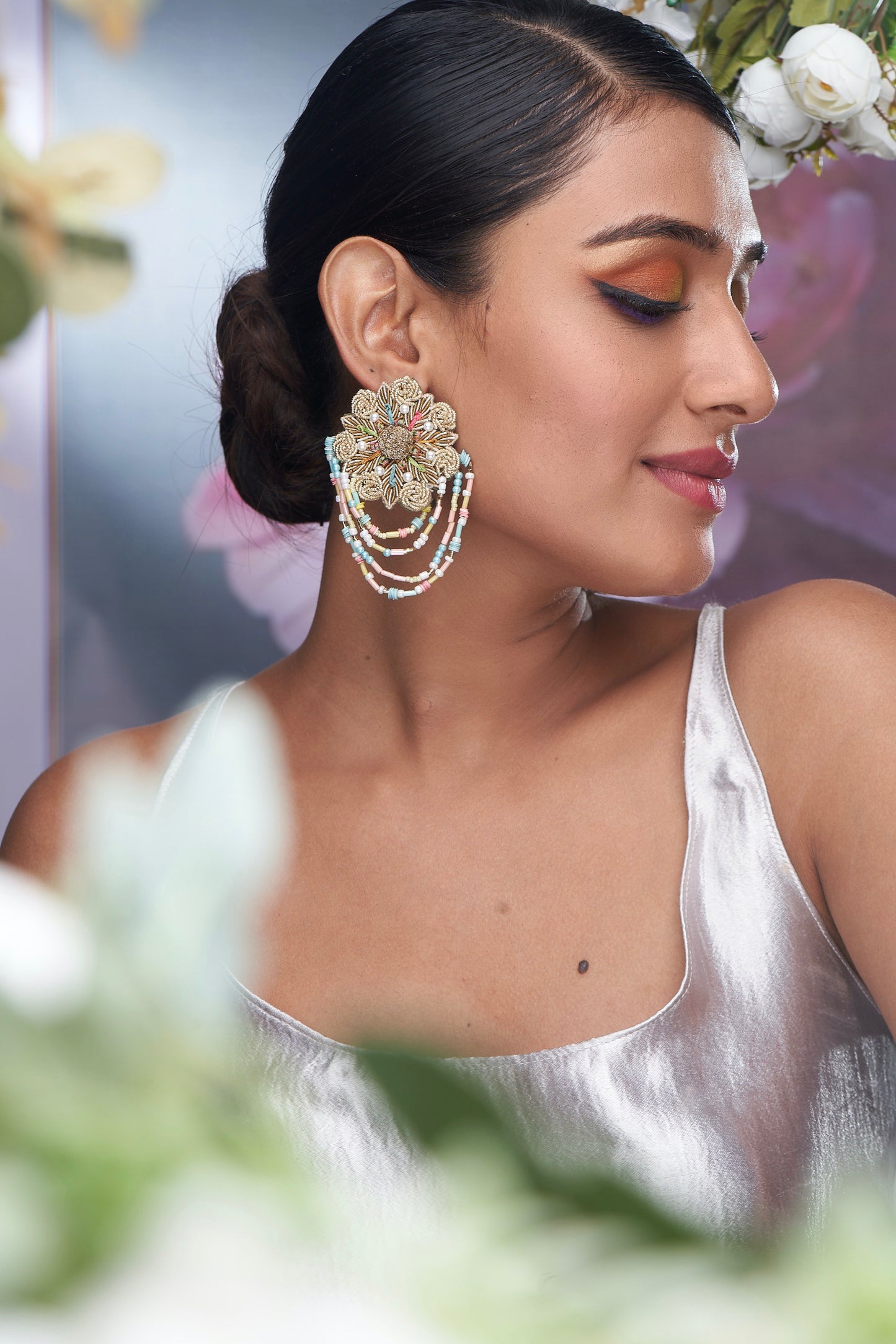 PAIR OF EARRINGS IN BUTTON