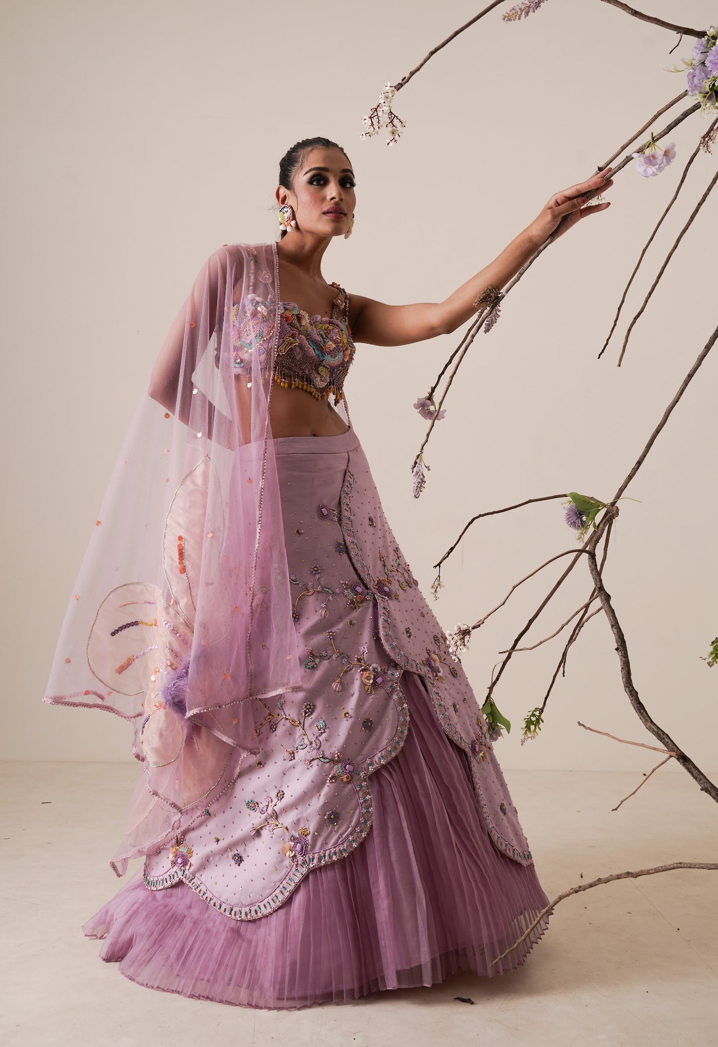 Lavender lehenga set pleated front detail and a applique embroidery dupatta.