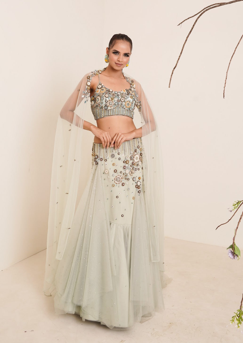 Aqua fish cut lehenga with spaghetti blouse