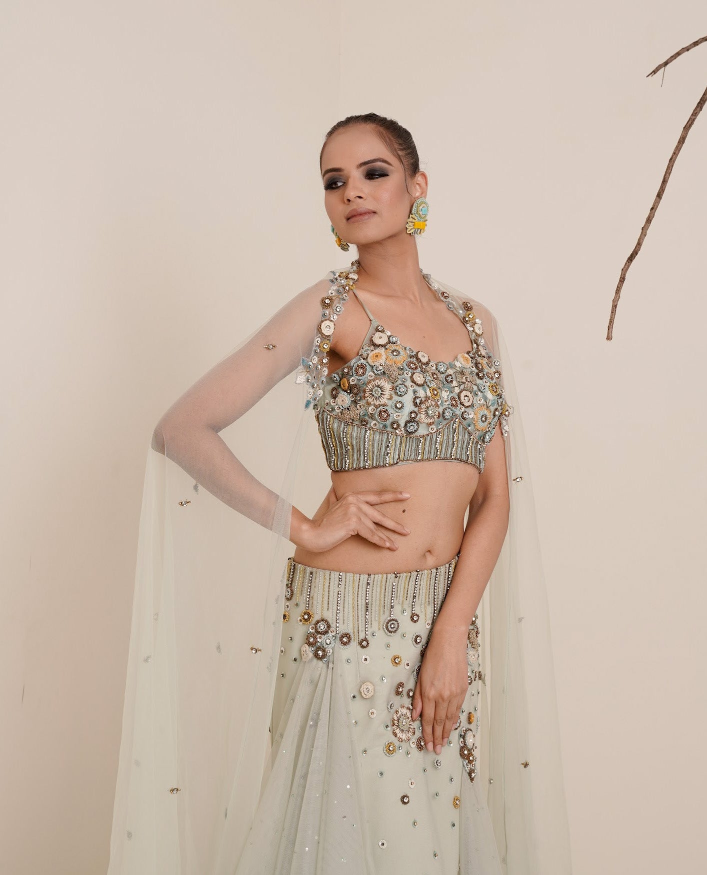 Aqua fish cut lehenga with spaghetti blouse