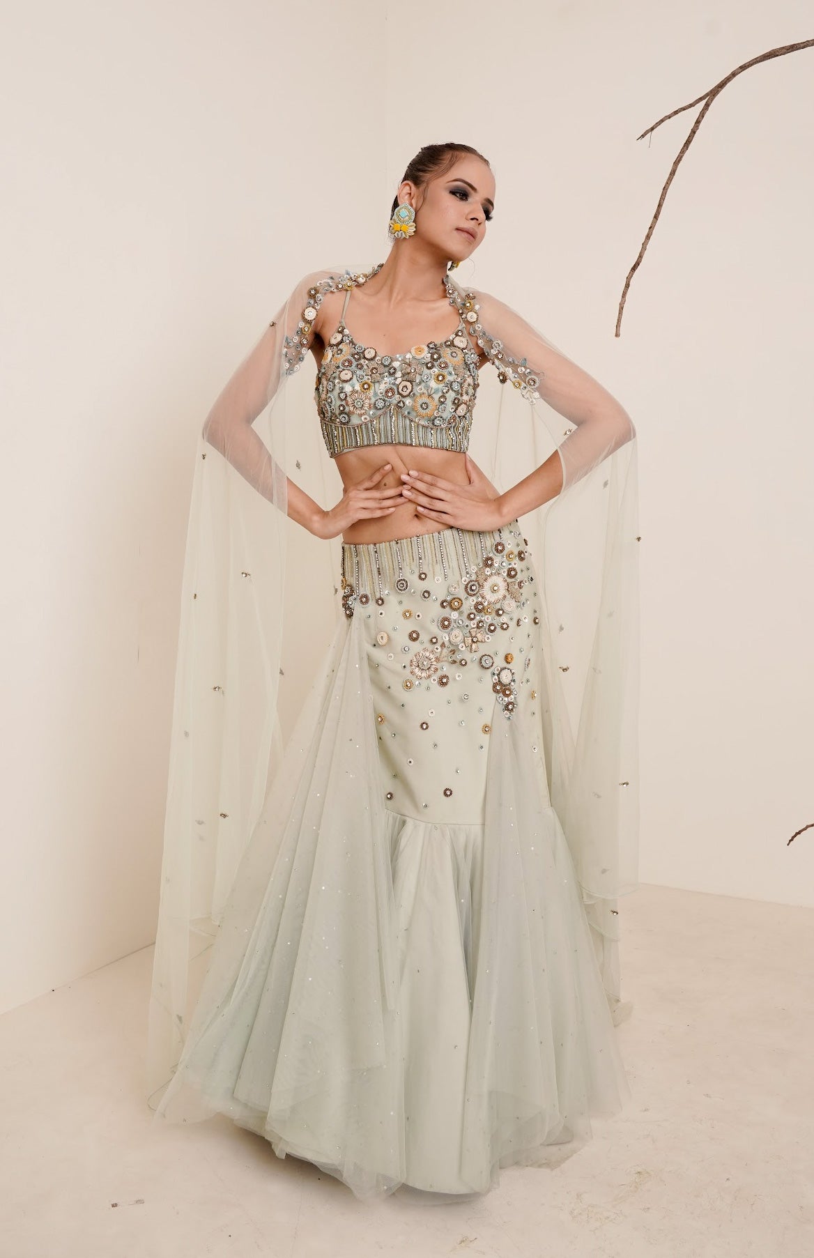 Aqua fish cut lehenga with spaghetti blouse