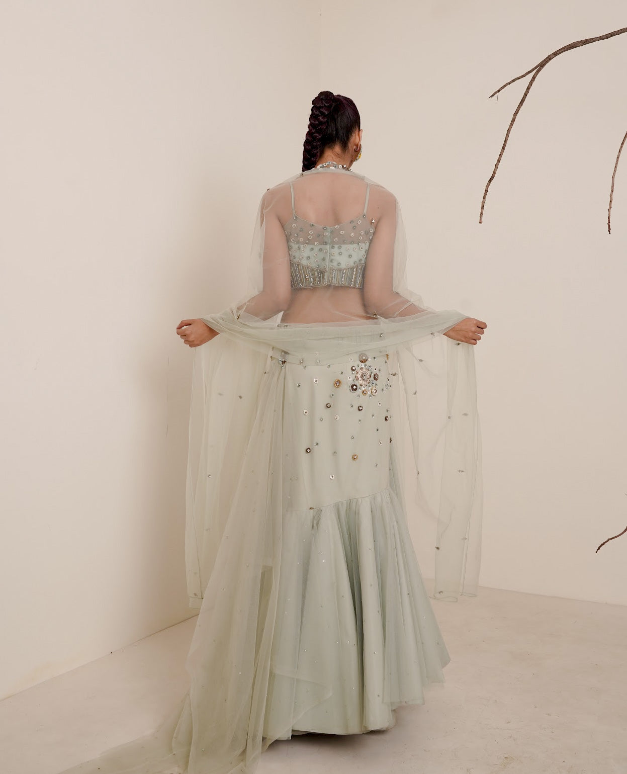 Aqua fish cut lehenga with spaghetti blouse