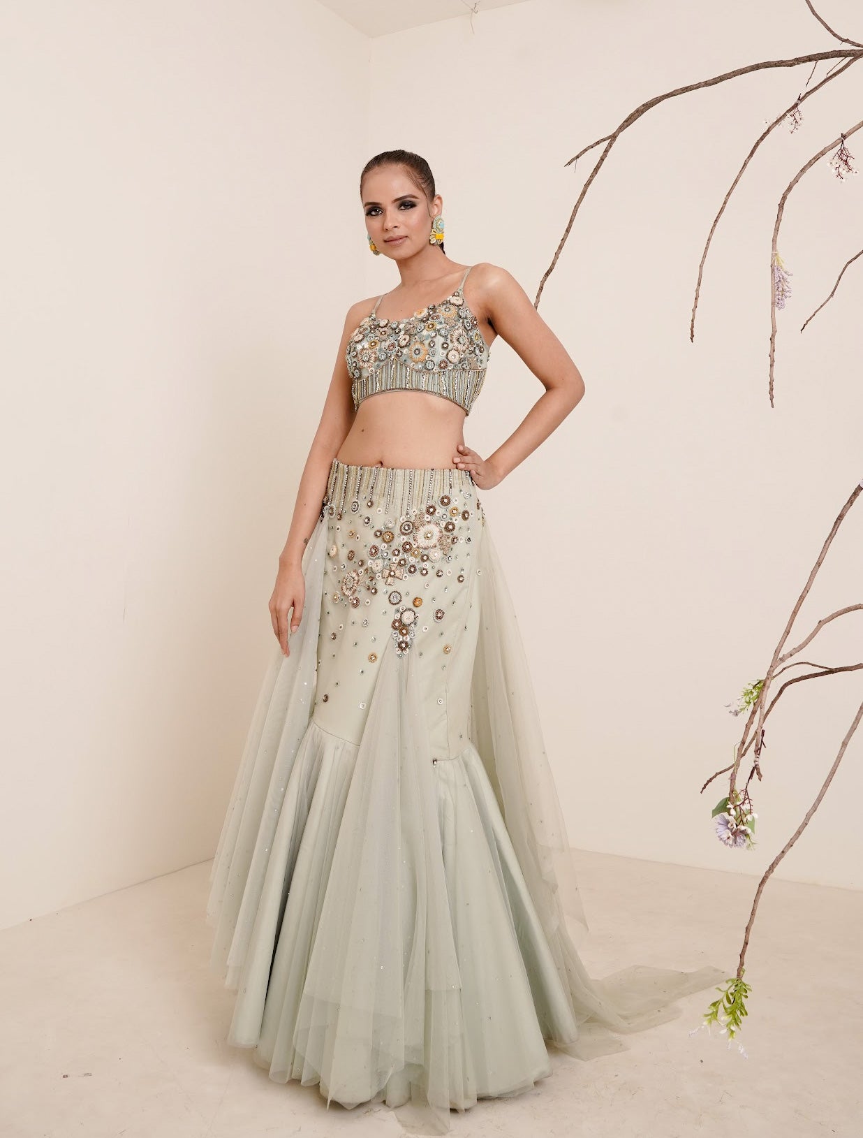 Aqua fish cut lehenga with spaghetti blouse