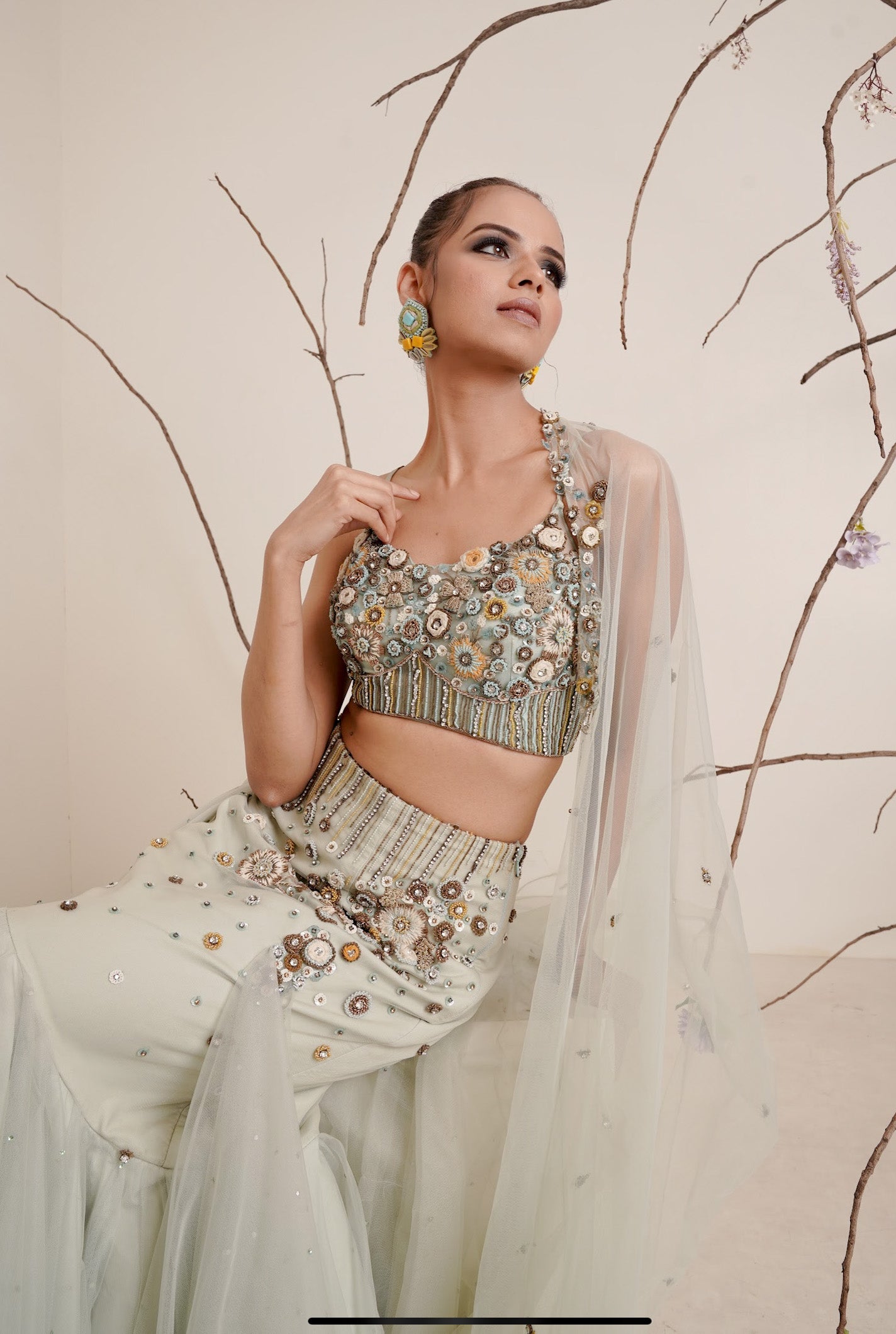 Aqua fish cut lehenga with spaghetti blouse