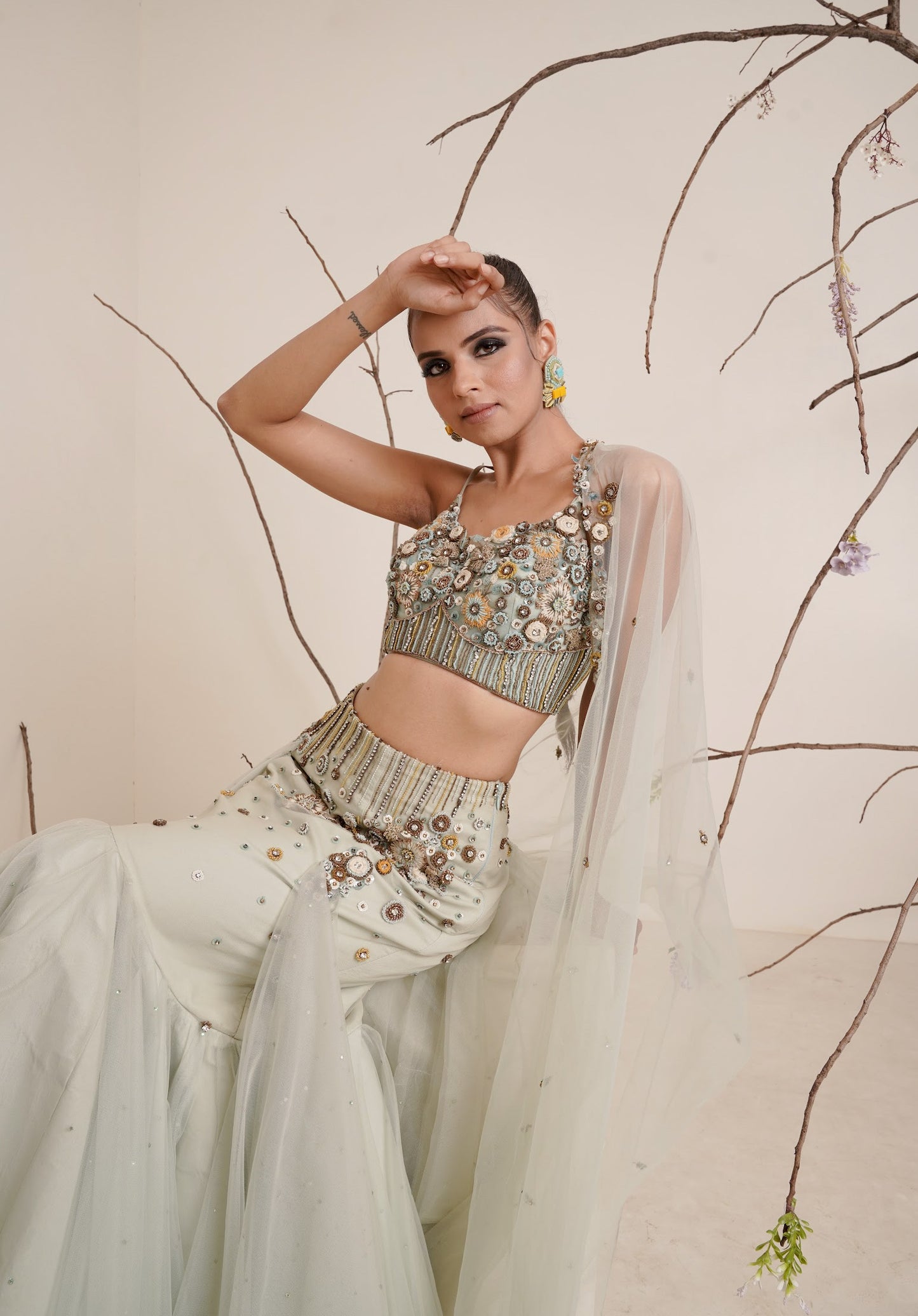 Aqua fish cut lehenga with spaghetti blouse
