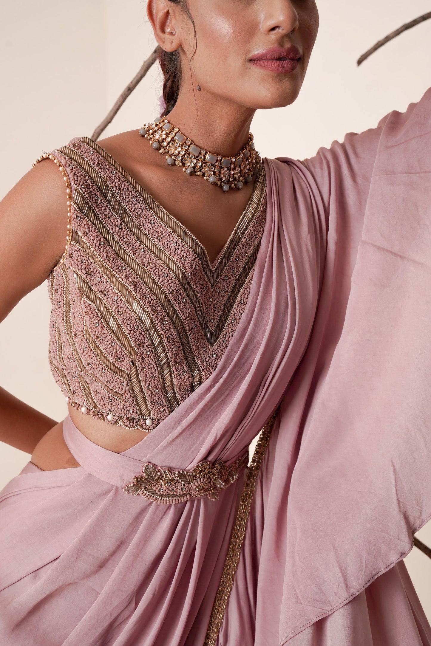 Ruffle saree with sequin embroidery blouse.