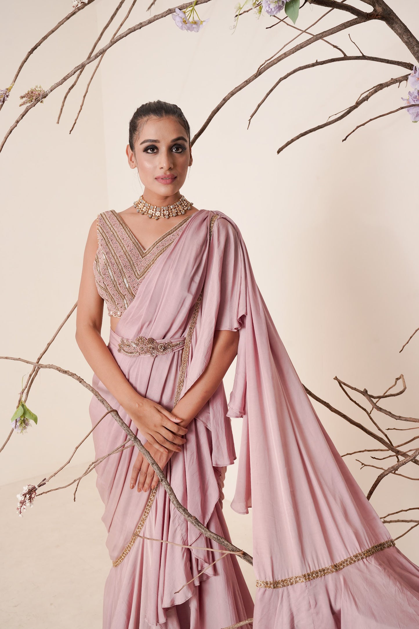 Ruffle saree with sequin embroidery blouse.