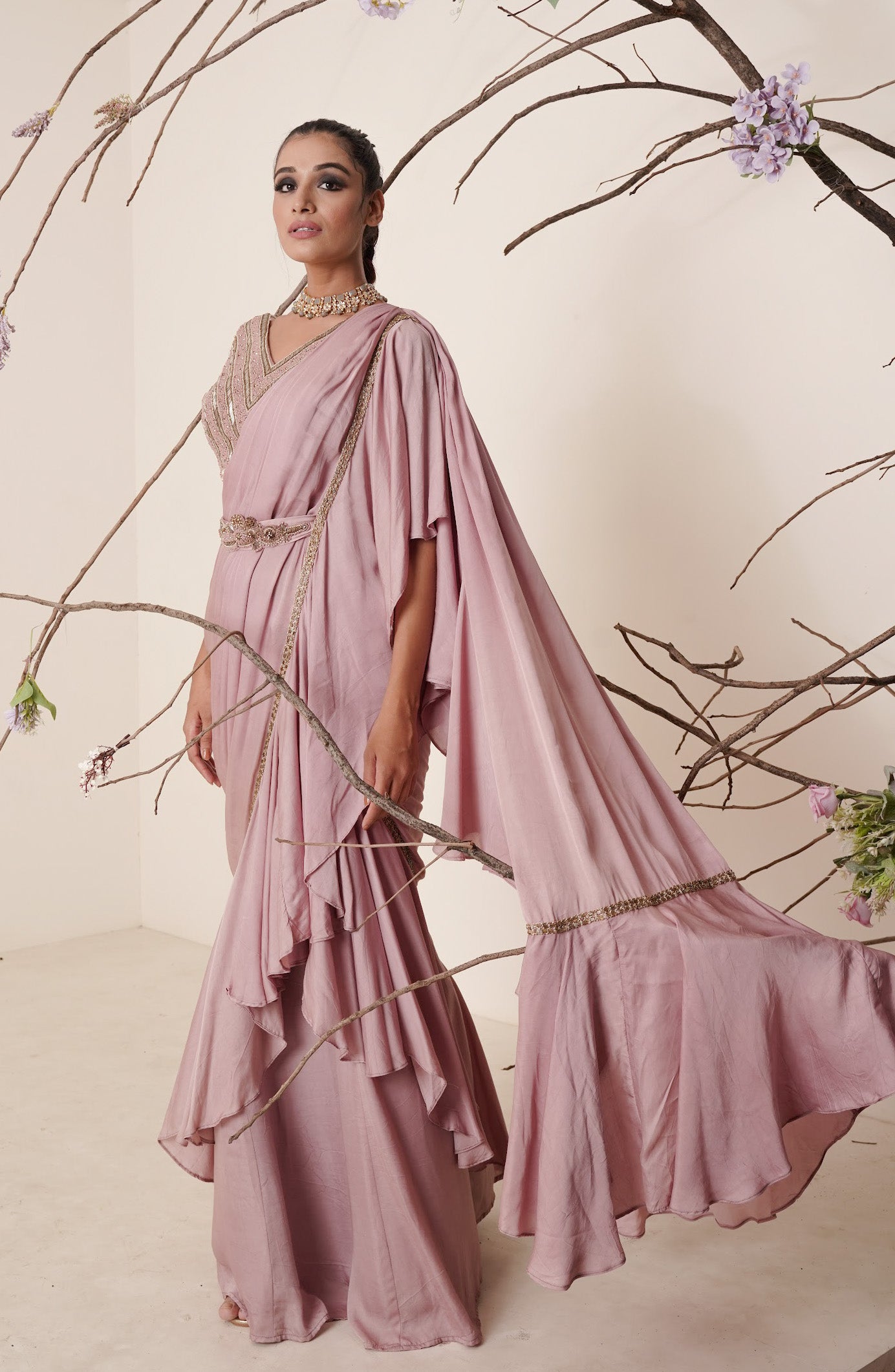 Ruffle saree with sequin embroidery blouse.