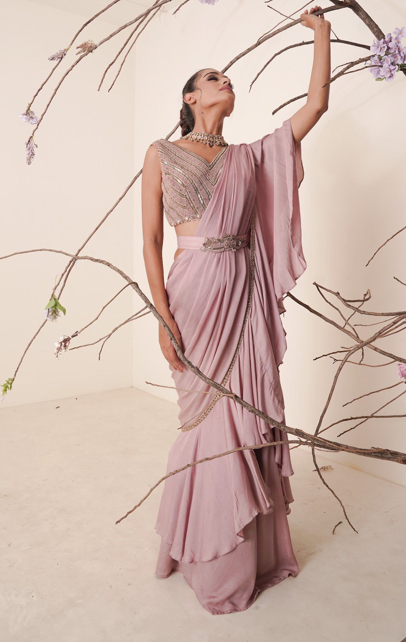 Ruffle saree with sequin embroidery blouse.
