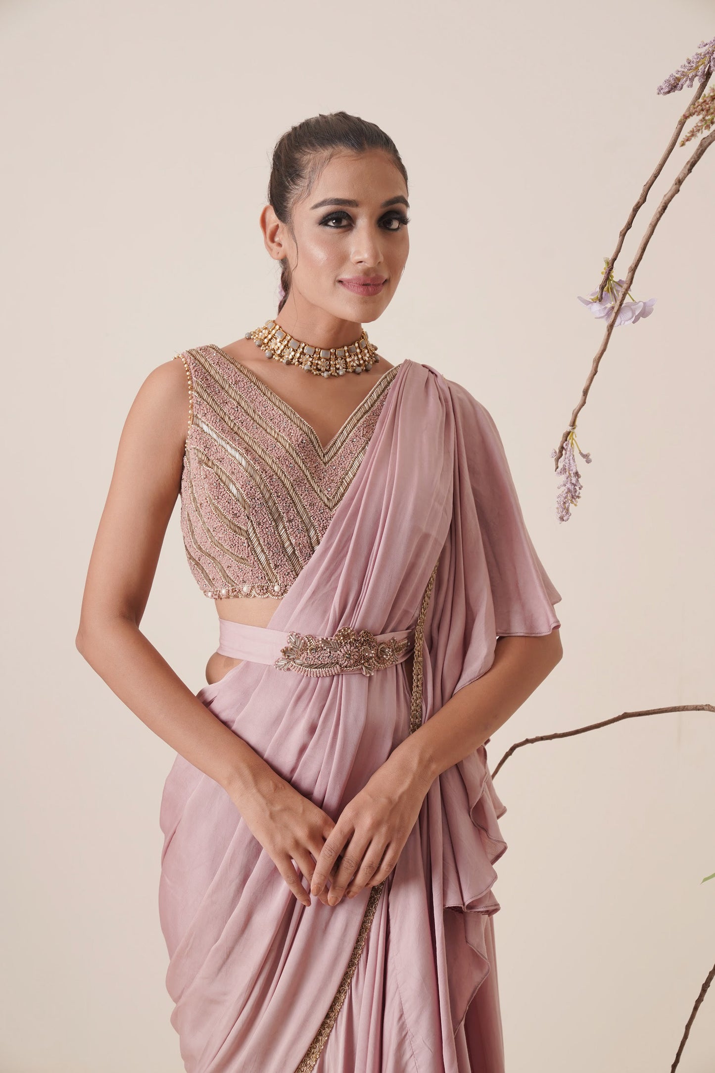 Ruffle saree with sequin embroidery blouse.