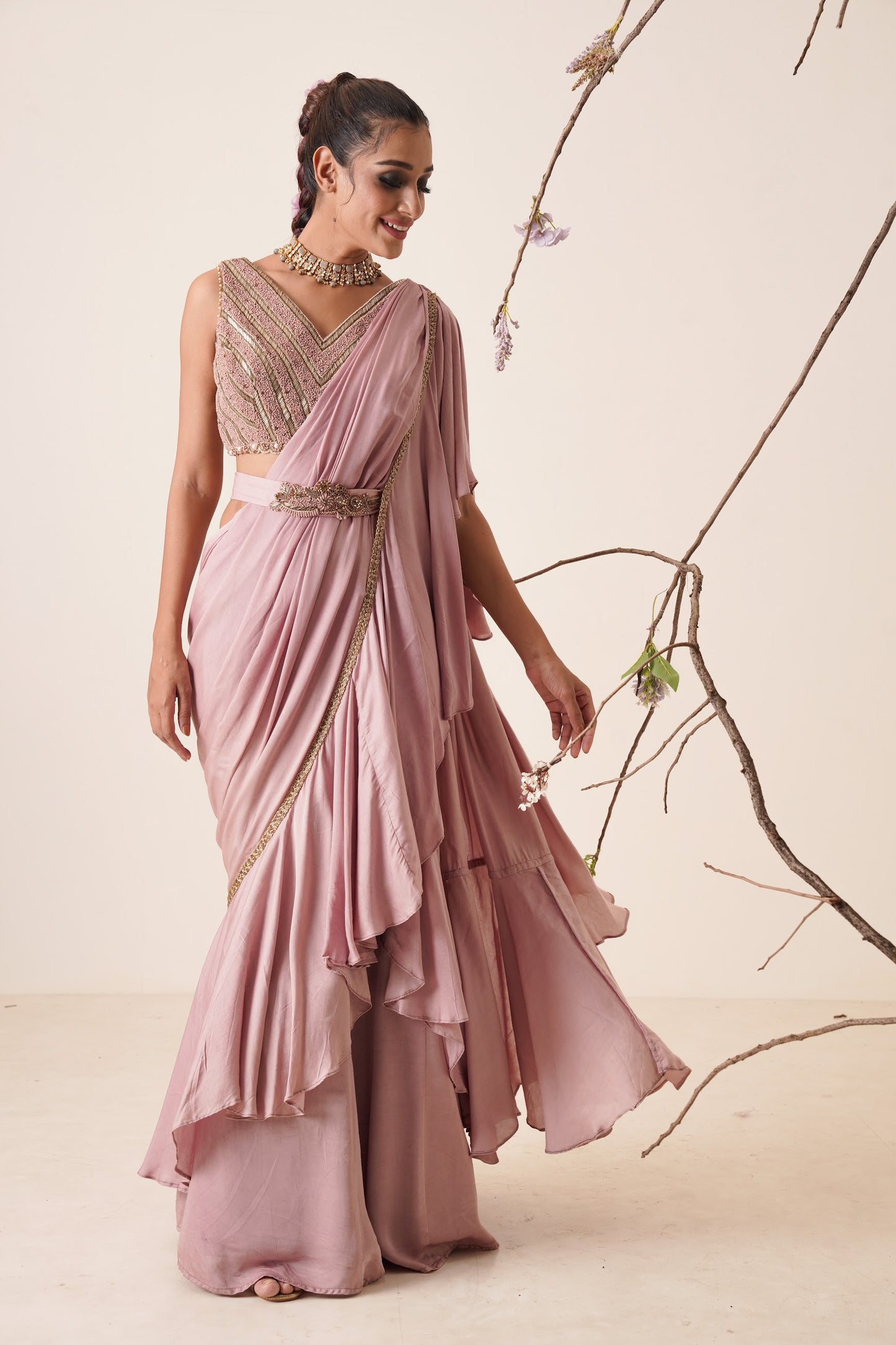 Ruffle saree with sequin embroidery blouse.
