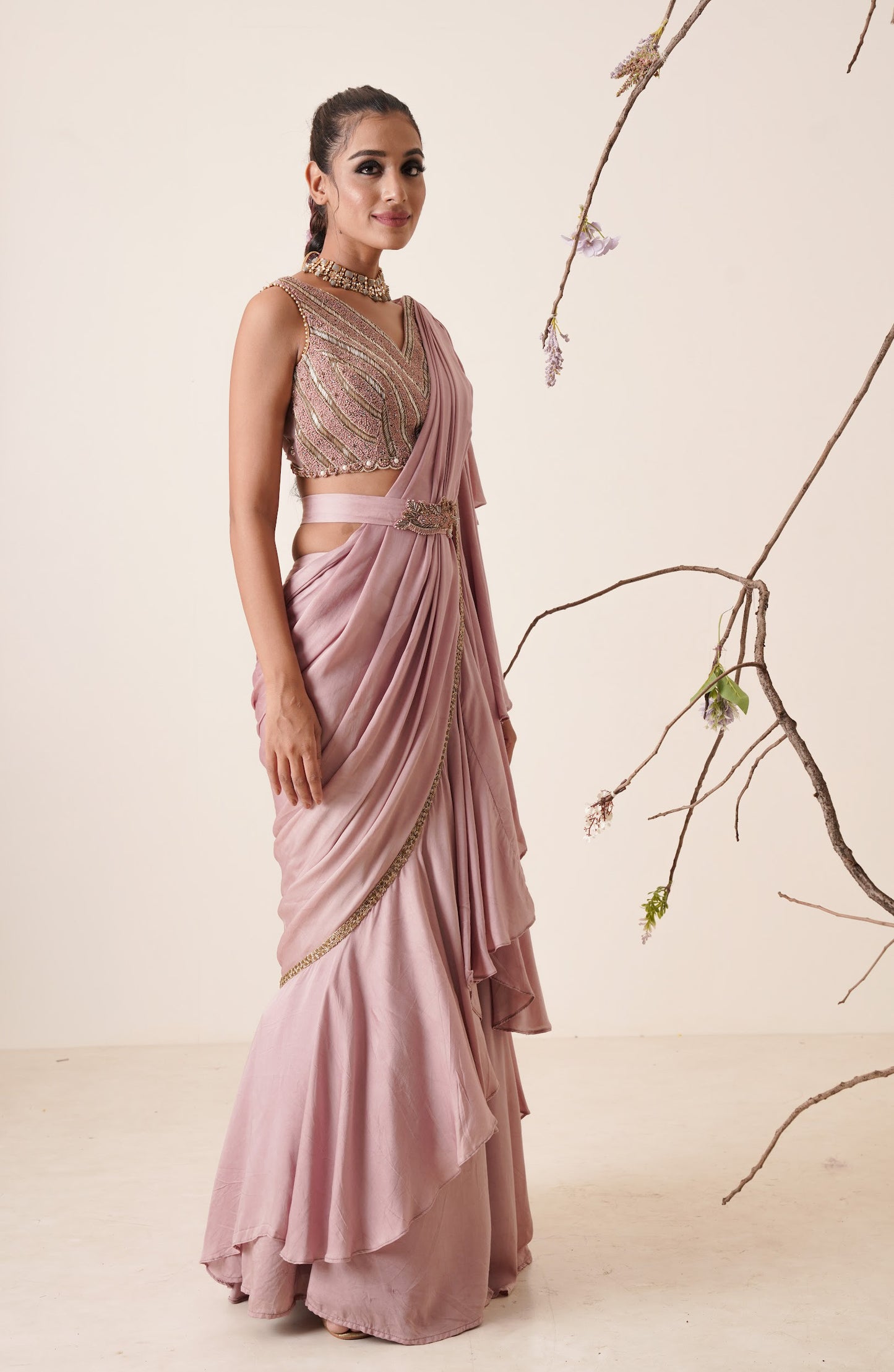 Ruffle saree with sequin embroidery blouse.