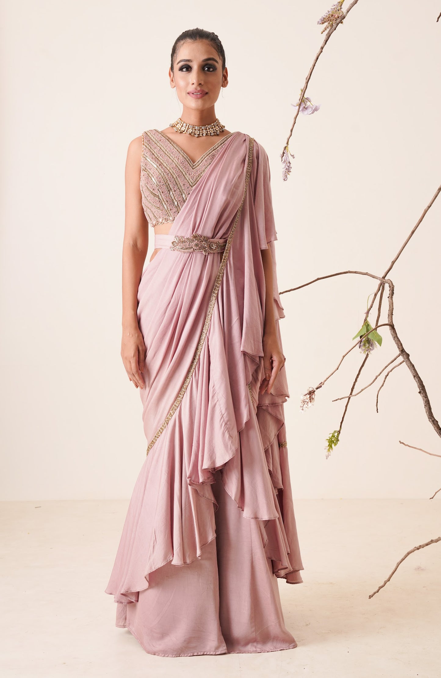 Ruffle saree with sequin embroidery blouse.