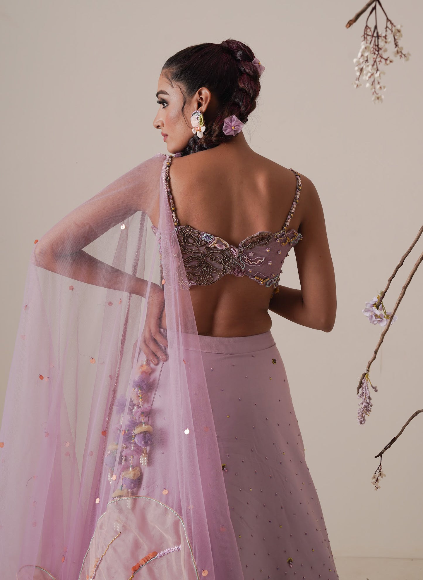 Lavender lehenga set pleated front detail and a applique embroidery dupatta.