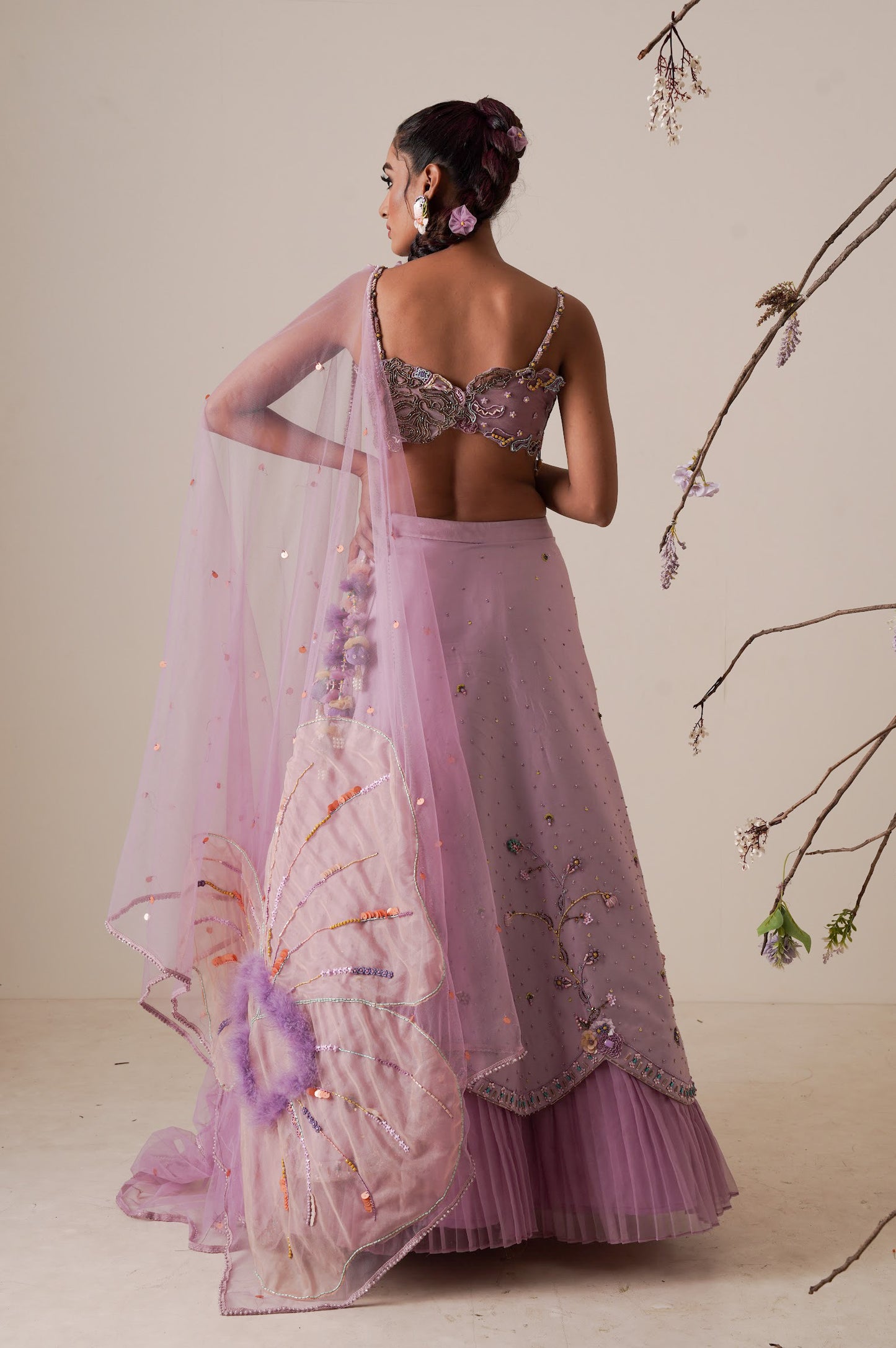 Lavender lehenga set pleated front detail and a applique embroidery dupatta.