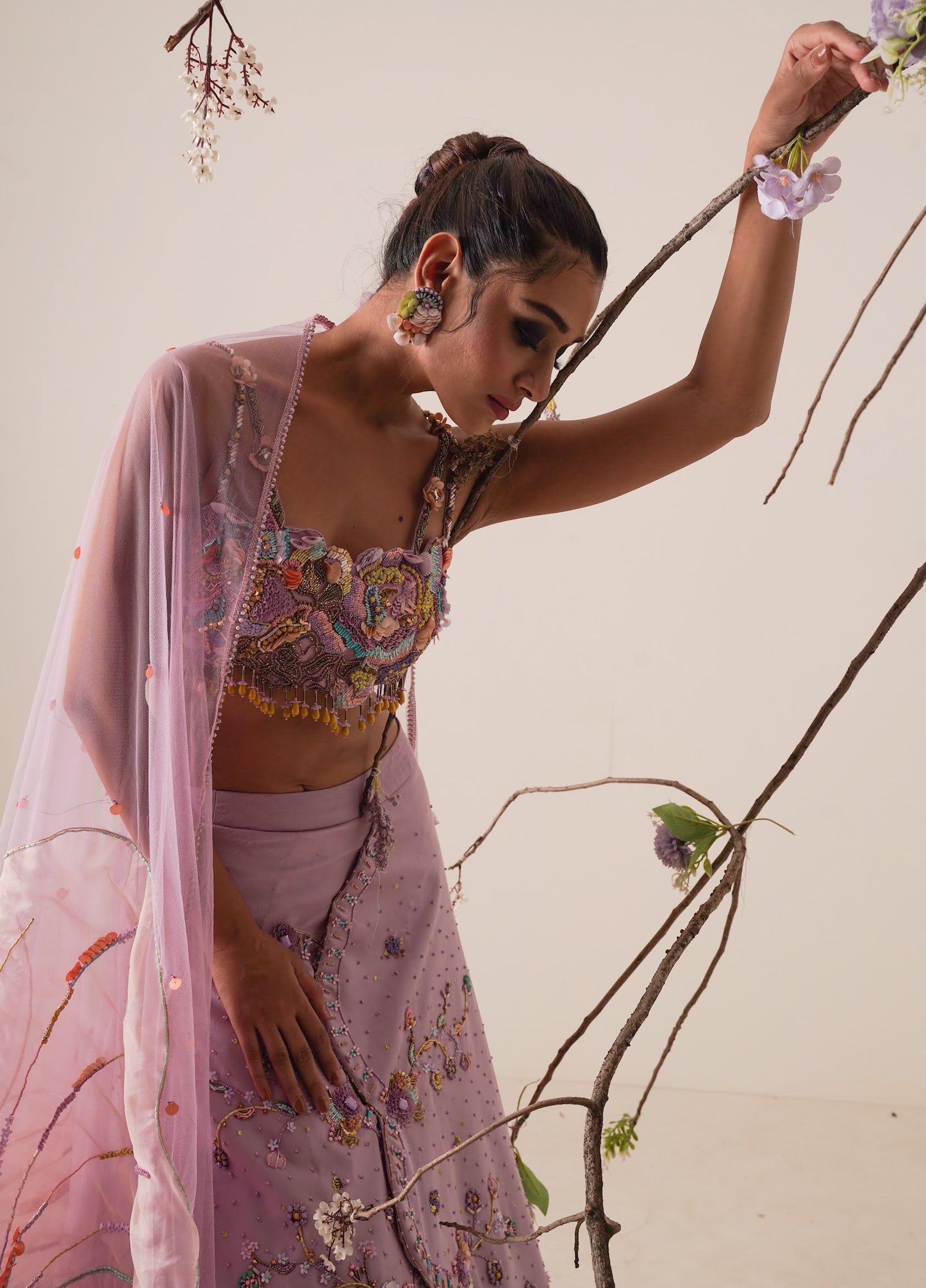 Lavender lehenga set pleated front detail and a applique embroidery dupatta.