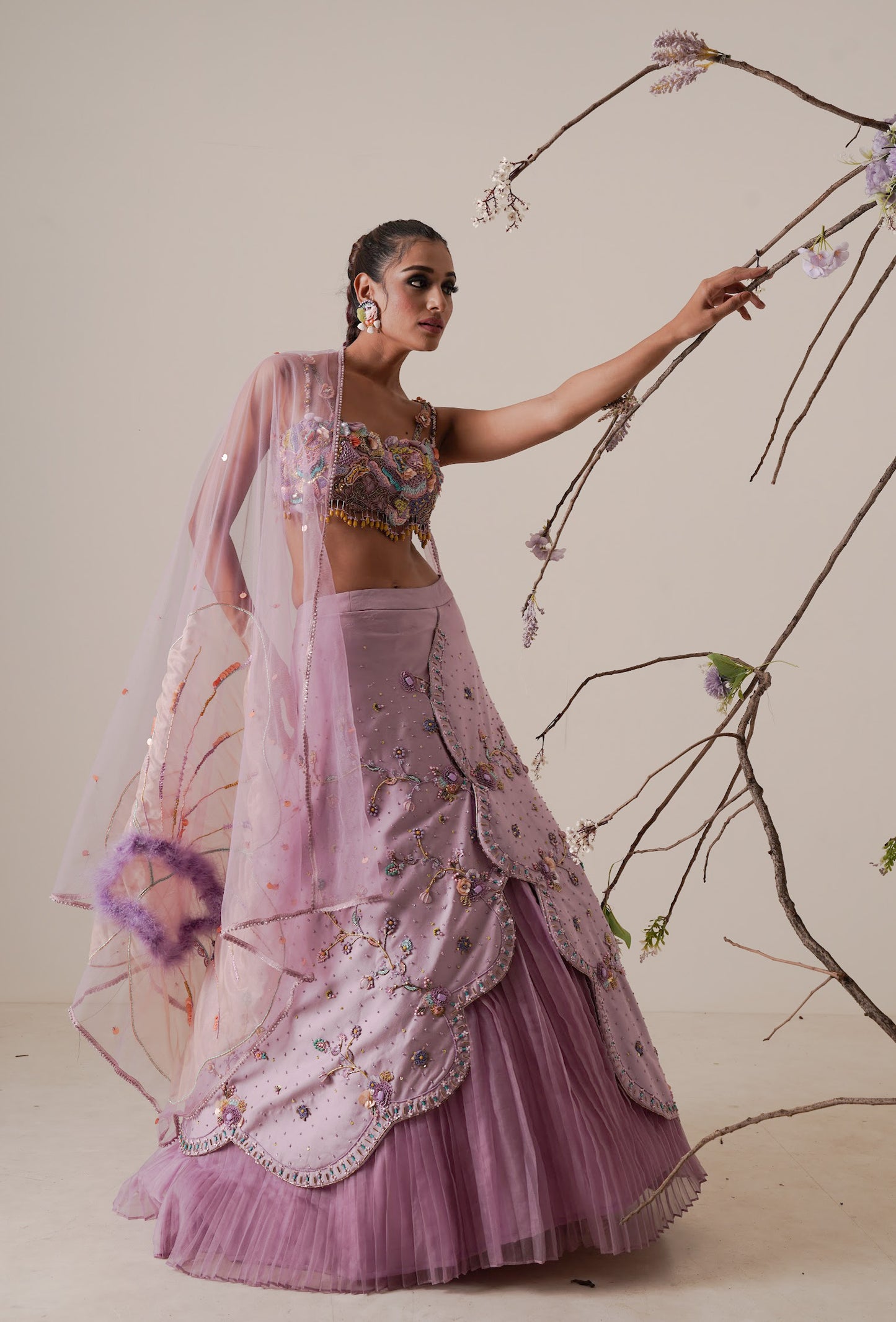 Lavender lehenga set pleated front detail and a applique embroidery dupatta.
