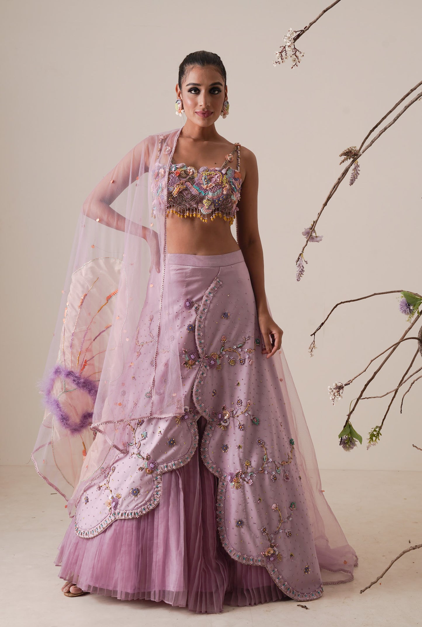 Lavender lehenga set pleated front detail and a applique embroidery dupatta.