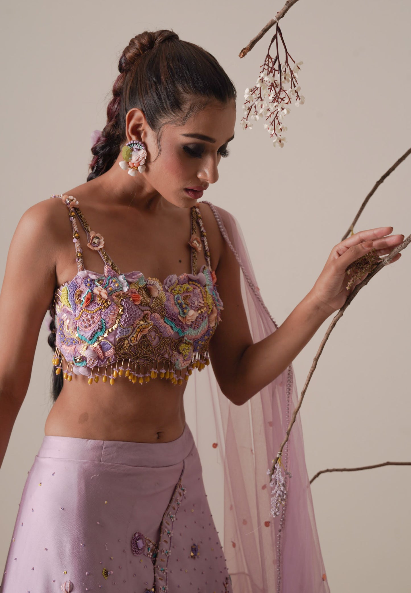 Lavender lehenga set pleated front detail and a applique embroidery dupatta.