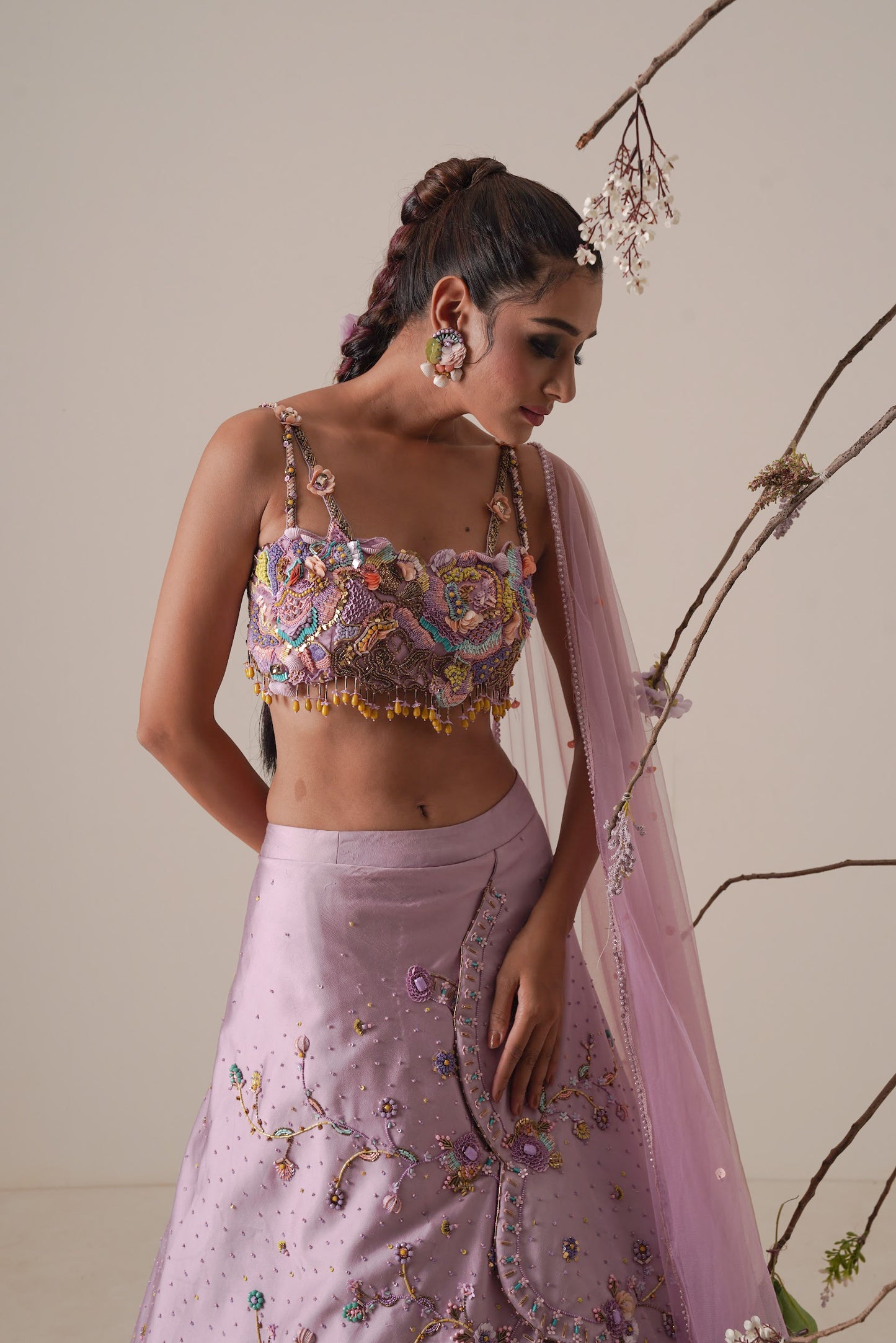 Lavender lehenga set pleated front detail and a applique embroidery dupatta.