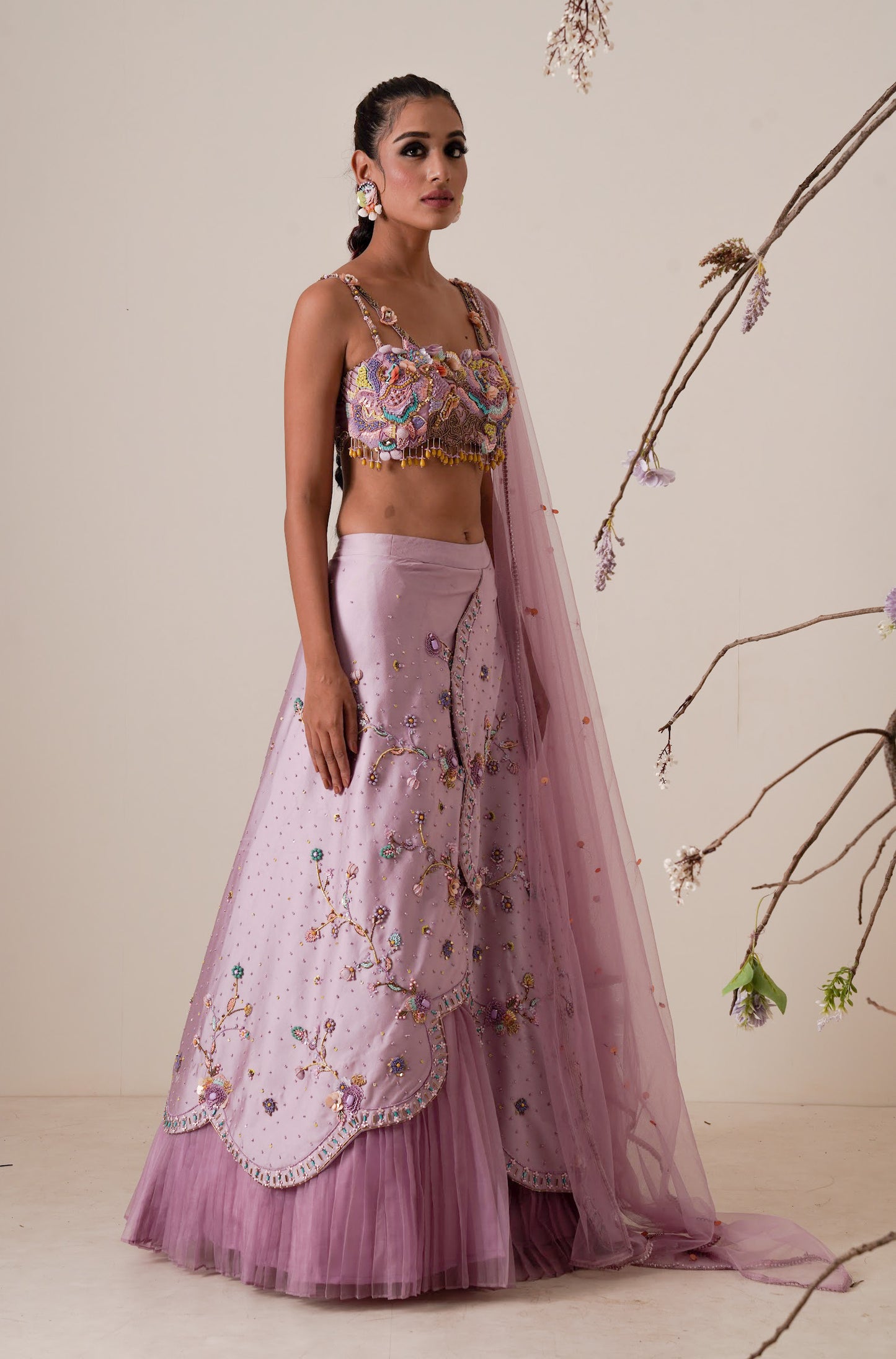 Lavender lehenga set pleated front detail and a applique embroidery dupatta.
