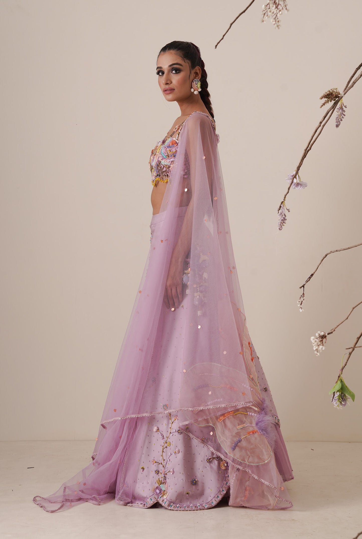 Lavender lehenga set pleated front detail and a applique embroidery dupatta.