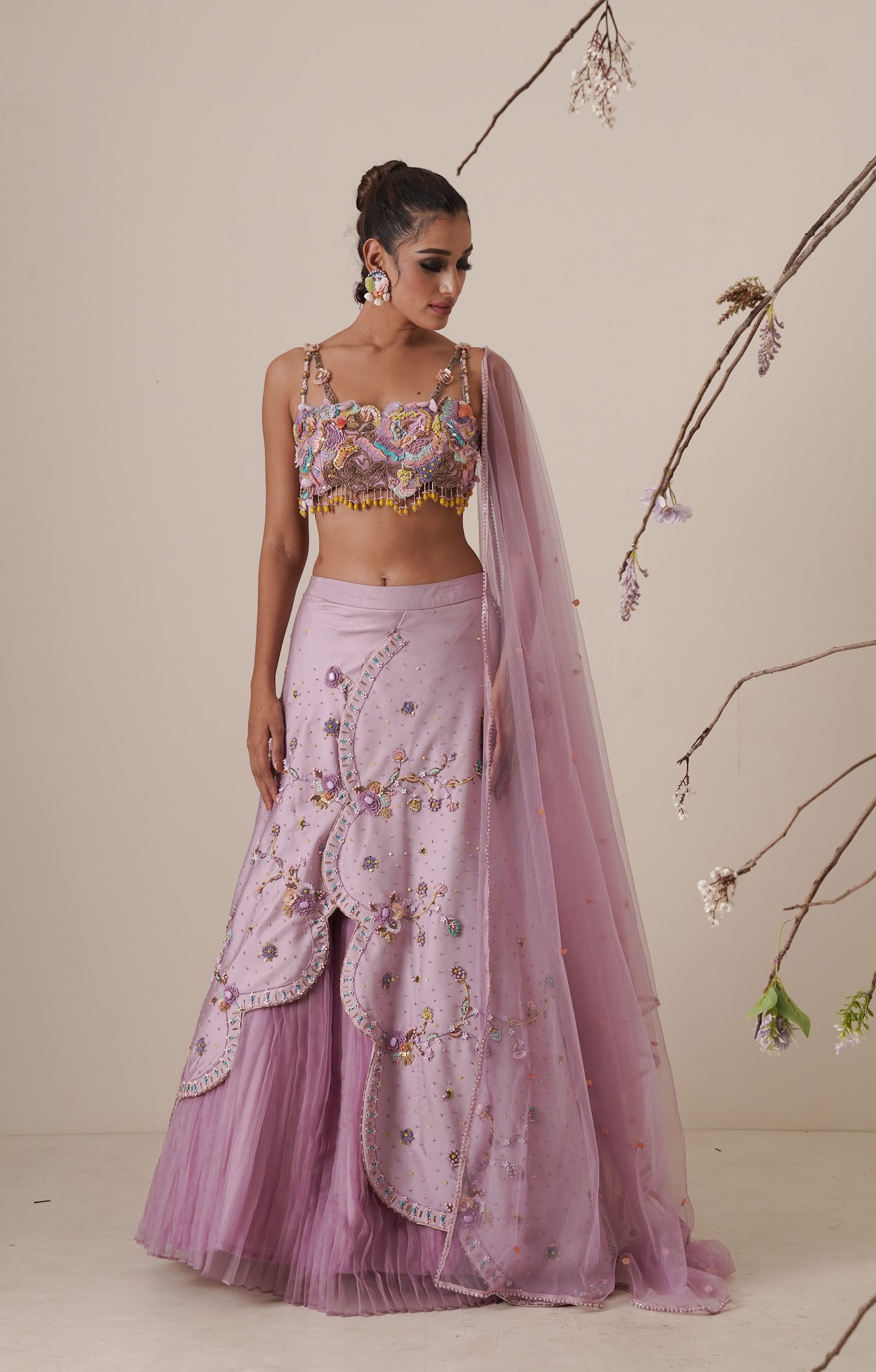 Lavender lehenga set pleated front detail and a applique embroidery dupatta.